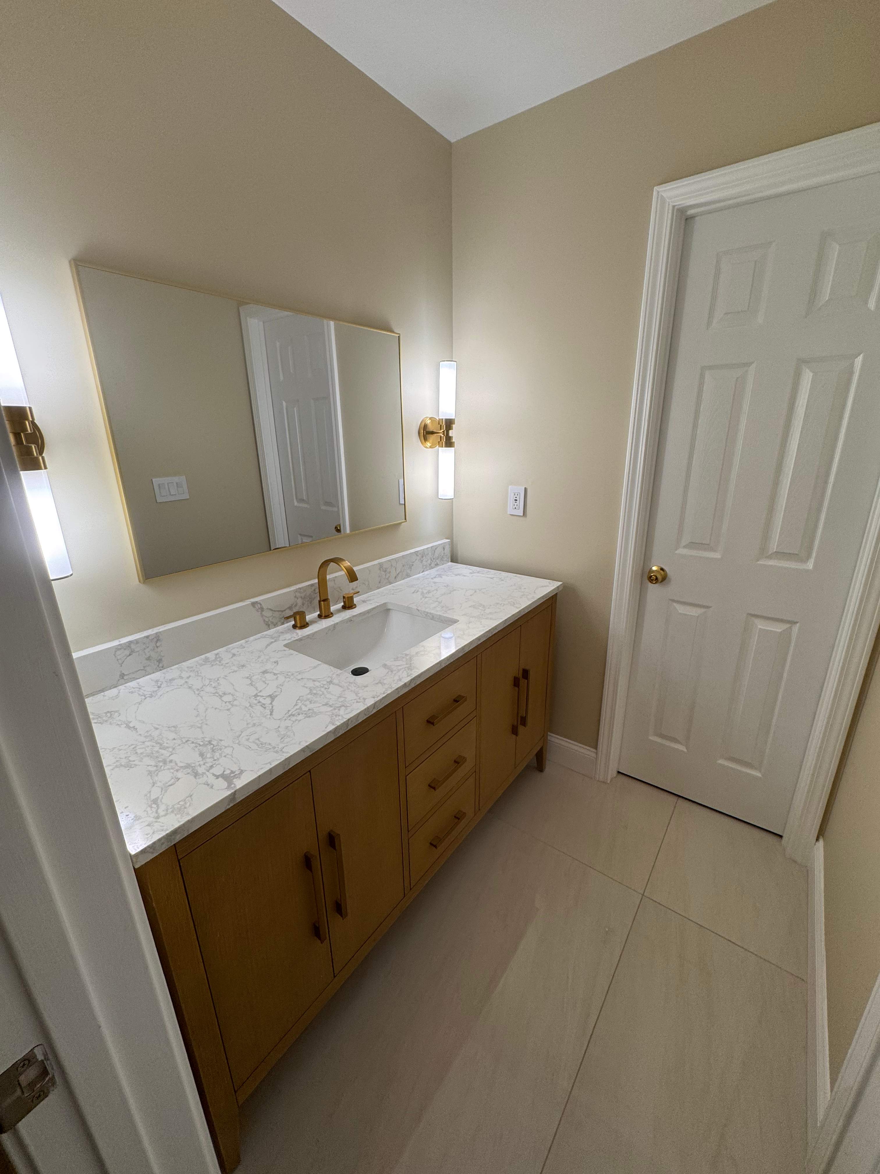 Jack and Jill bathroom renovation by Prudencio