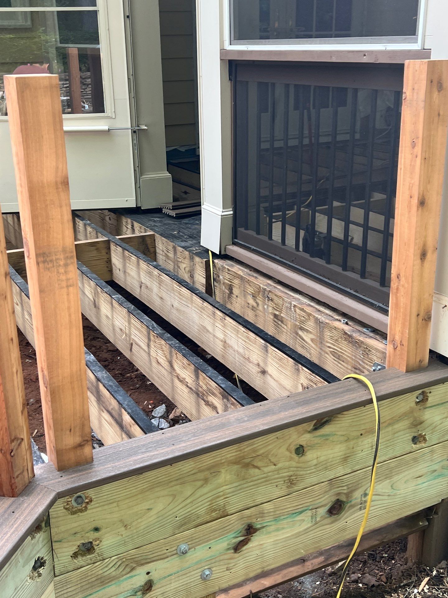 James Hardie Siding Install, Rotten Wood Replacement, Trex Deck Resurface, and Exterior Paint Project in Roswell, GA by Nelson Exteriors 