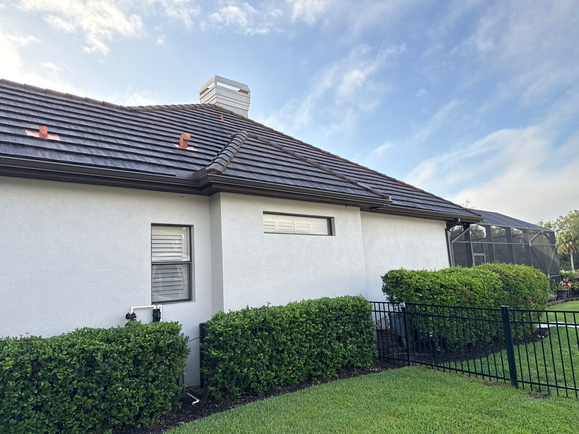 Tile Roof, Paver Pool Deck & Flowerbed Curbing Cleaning | Winding River Bradenton, FL Transformation by Sunshine AquaWash