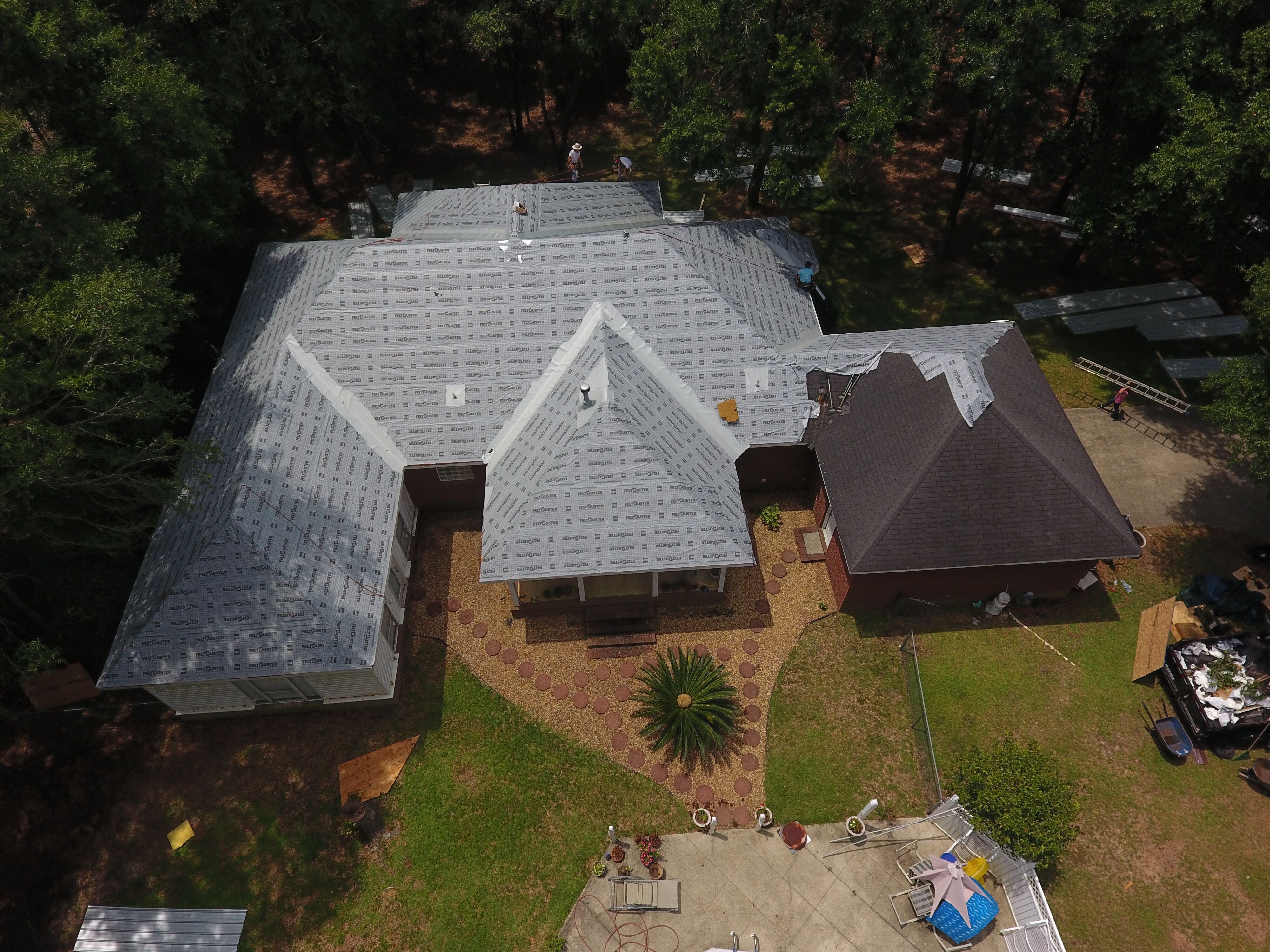 Residential Roofing Installation using Metal roofing by American Roofing & Construction LLC