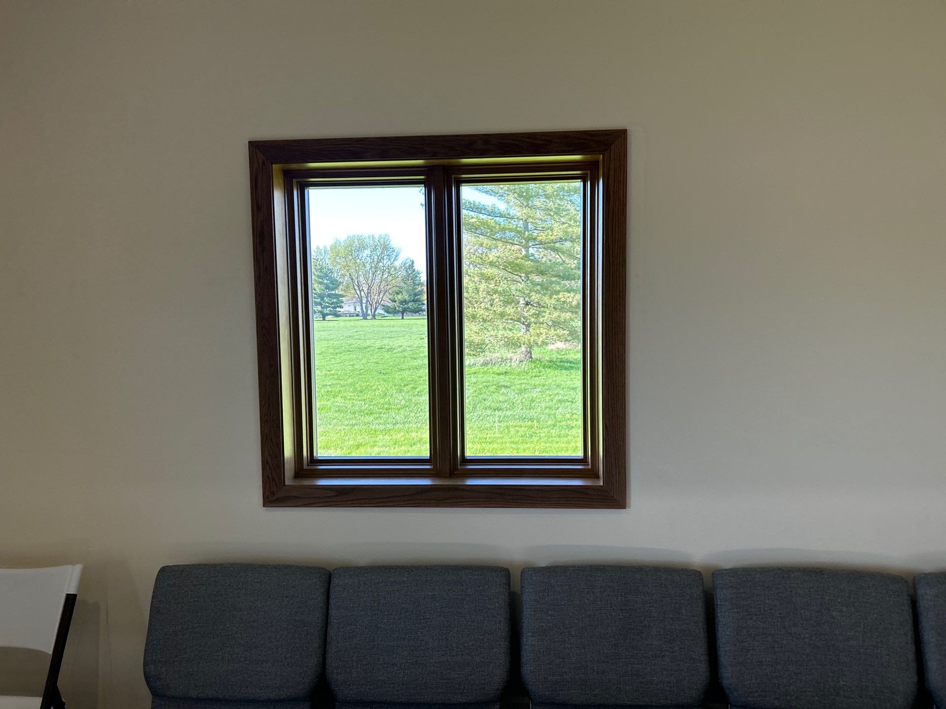 Window replacement using Pella Lifestyle wood/Aluminum window by United Windows and Siding LLC