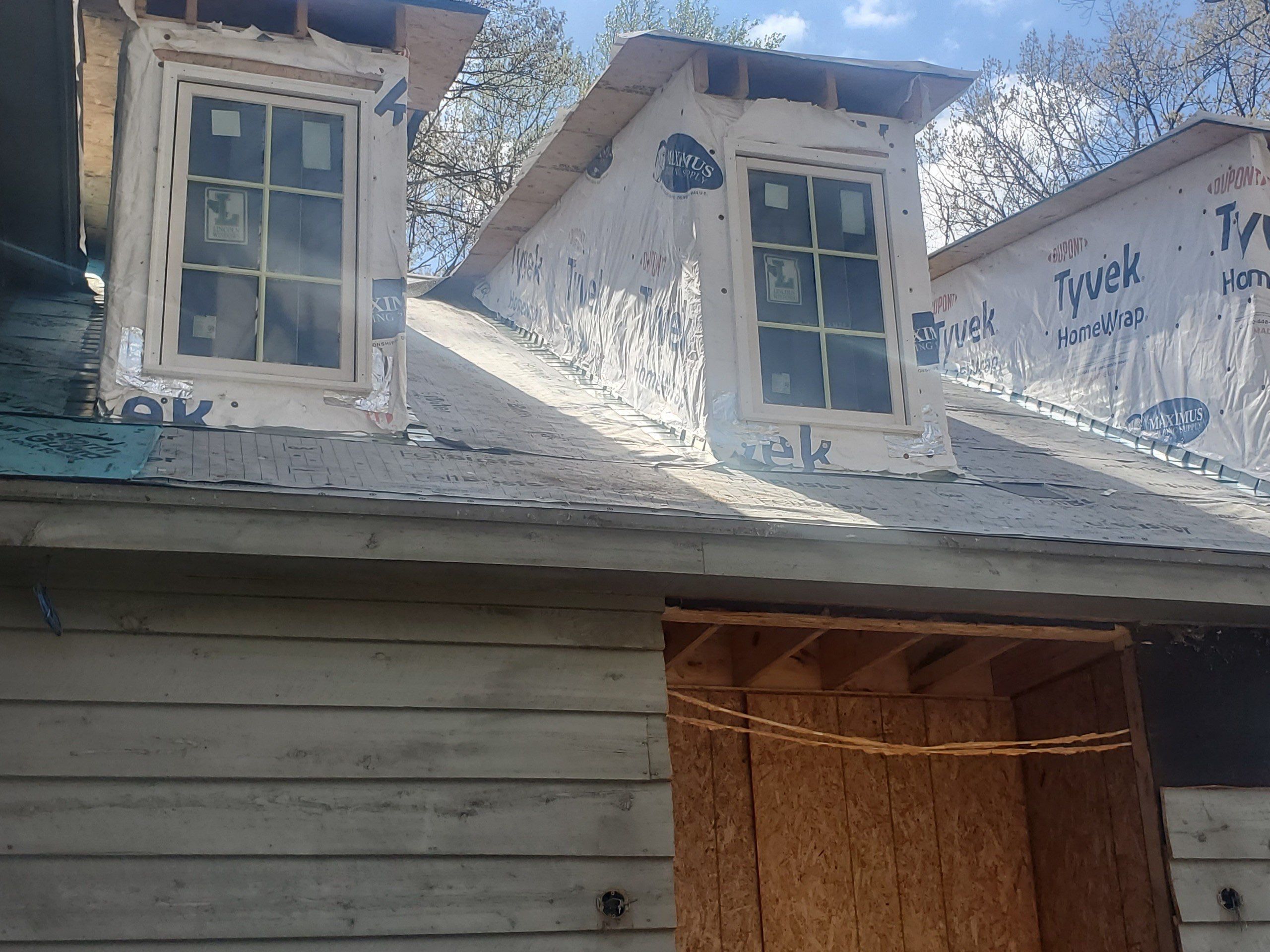 Residential Roof Replacement and Flat Roof Membrane in Memphis by Revival Roofing Services