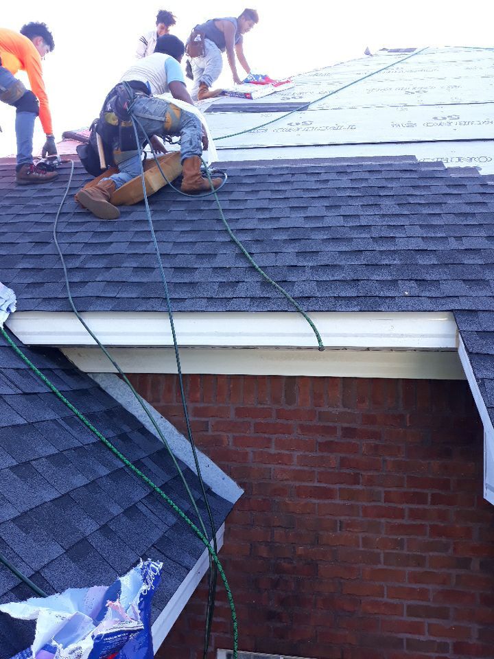 Residential Roofing Installation using Roof Replacement by American Roofing & Construction LLC