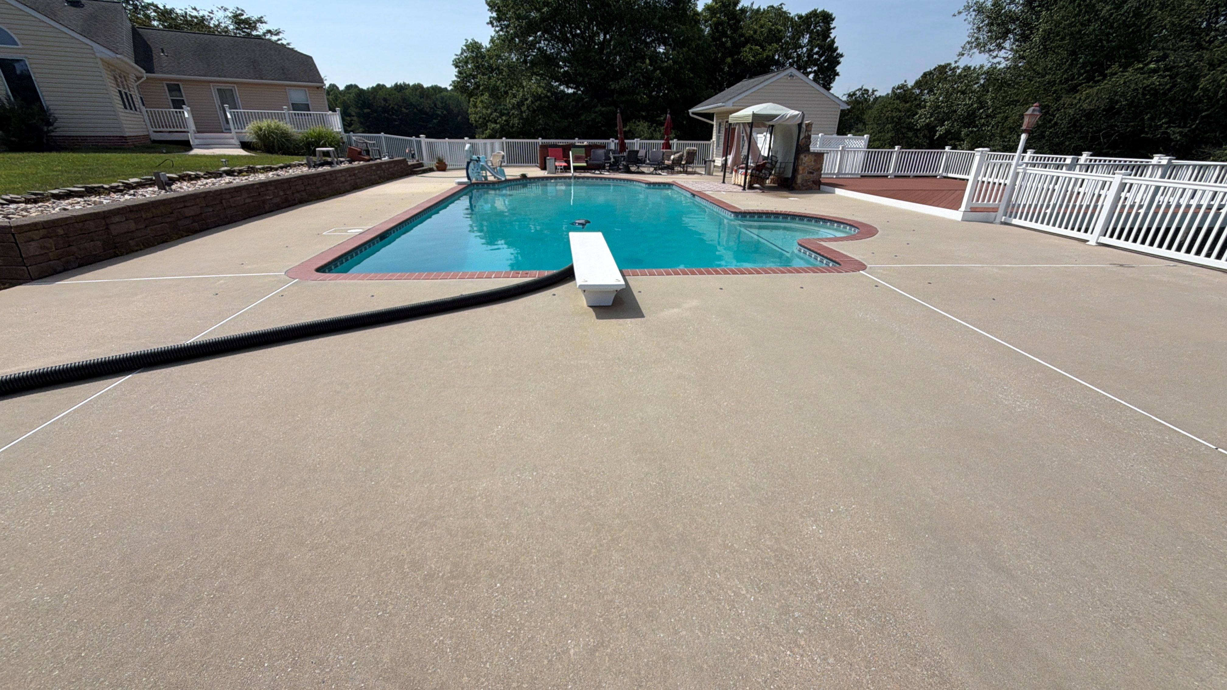 Concrete Pool Deck and Multi-Bay Building Cleaning in Eldersburg by Baltimore Pressure Washers Inc.