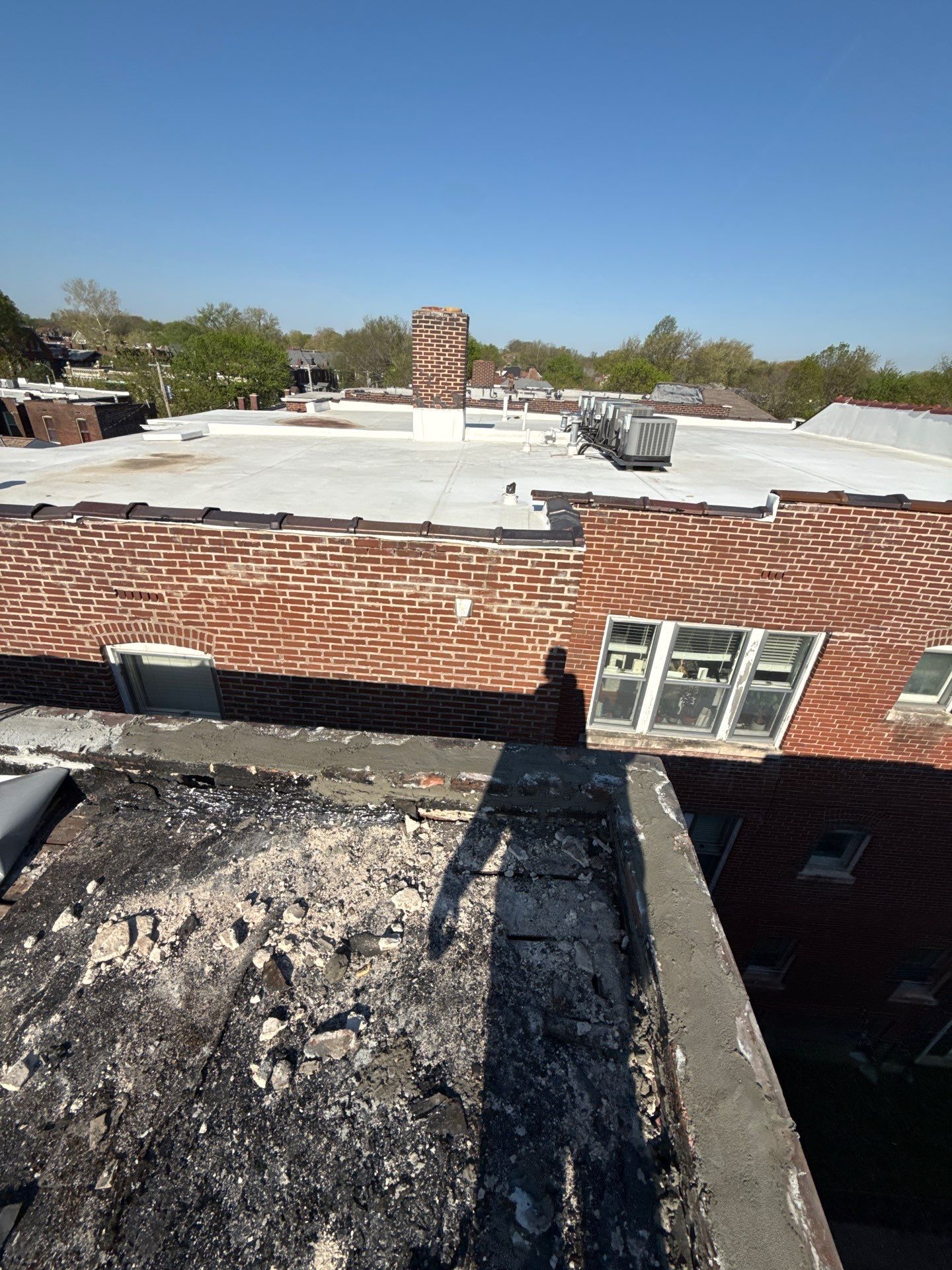 Multi-Family TPO Roof Installation and Masonry Repair in St. Louis by Acute Roofing And Exteriors