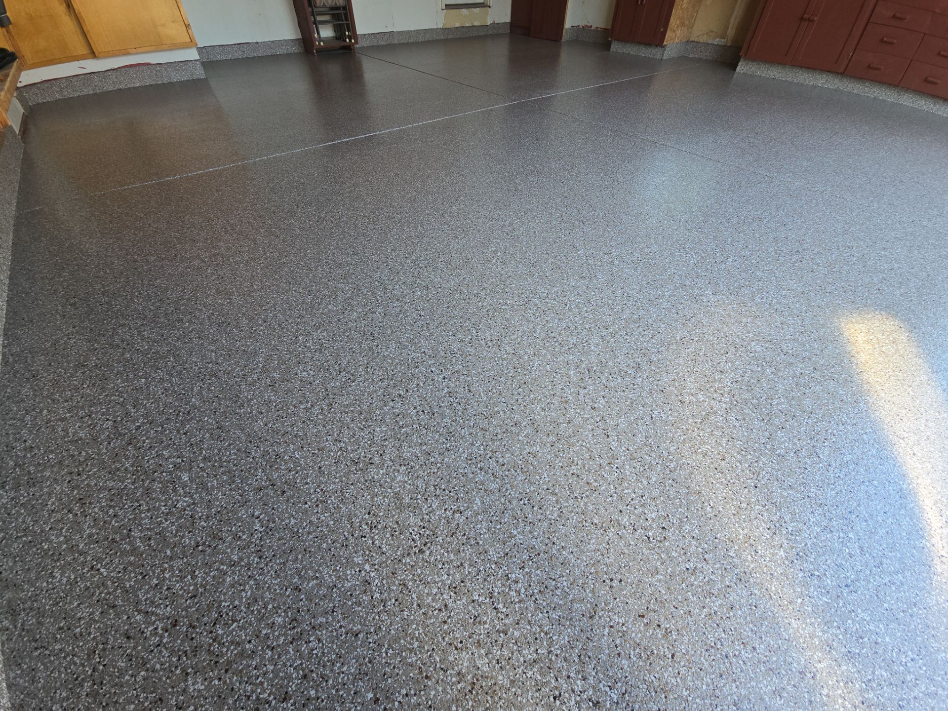 Garage Transformation using Pebble Beach by Croc Coatings, LLC
