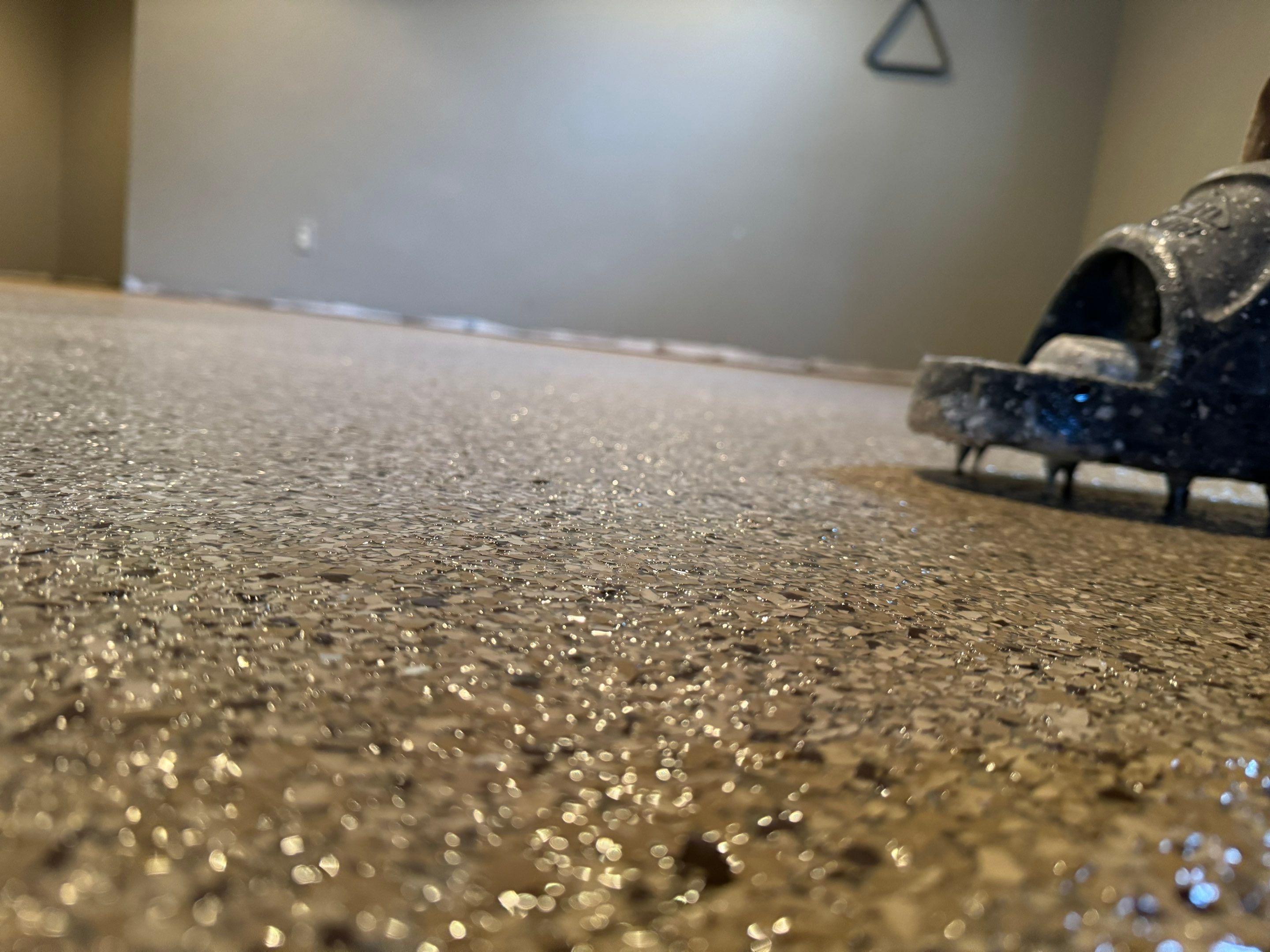 Custom Multi-Fleck Epoxy Floor Coating for Residential Basement by Select Painting, Coatings & Garage Cabinets