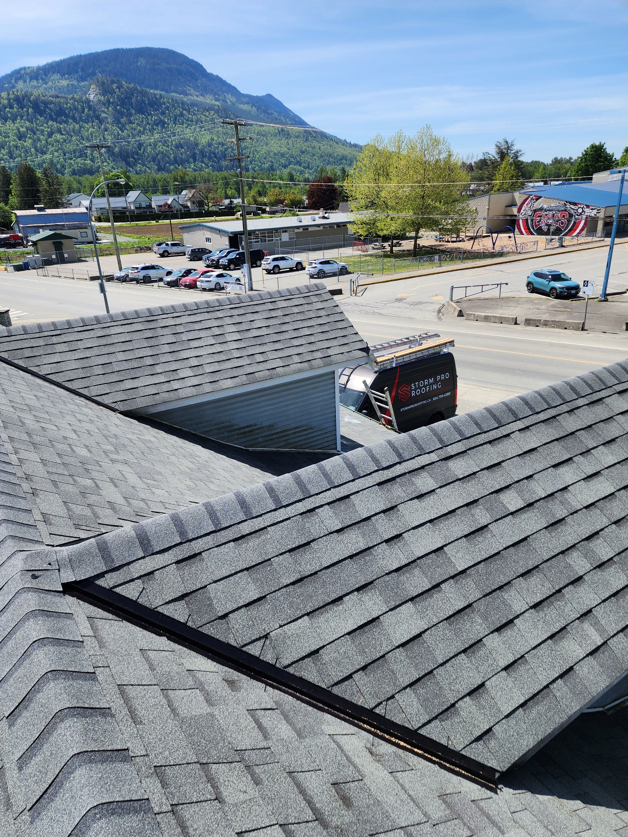 Residential Roofing Installation using Estate Gray Shingles by Top Notch Roofing Inc