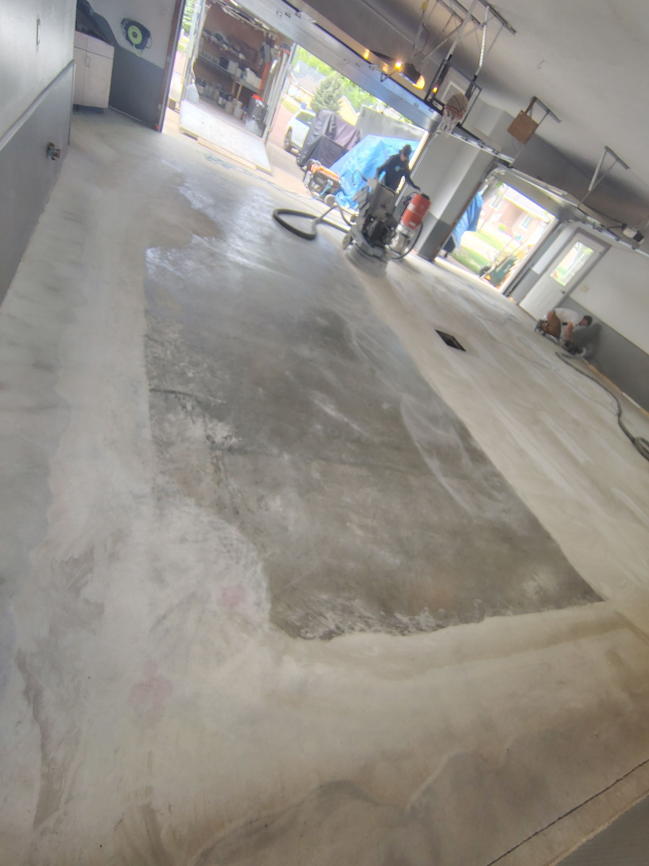 Multi-Fleck Epoxy Garage Floor Coating in Dell Rapids by Select Painting, Coatings & Garage Cabinets