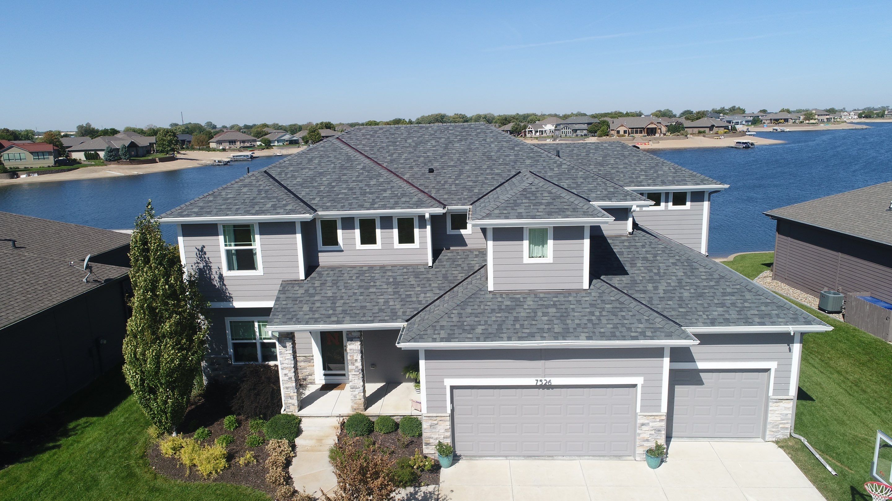 Residential Roofing Installation using Asphalt Shingles by Lightning Exteriors