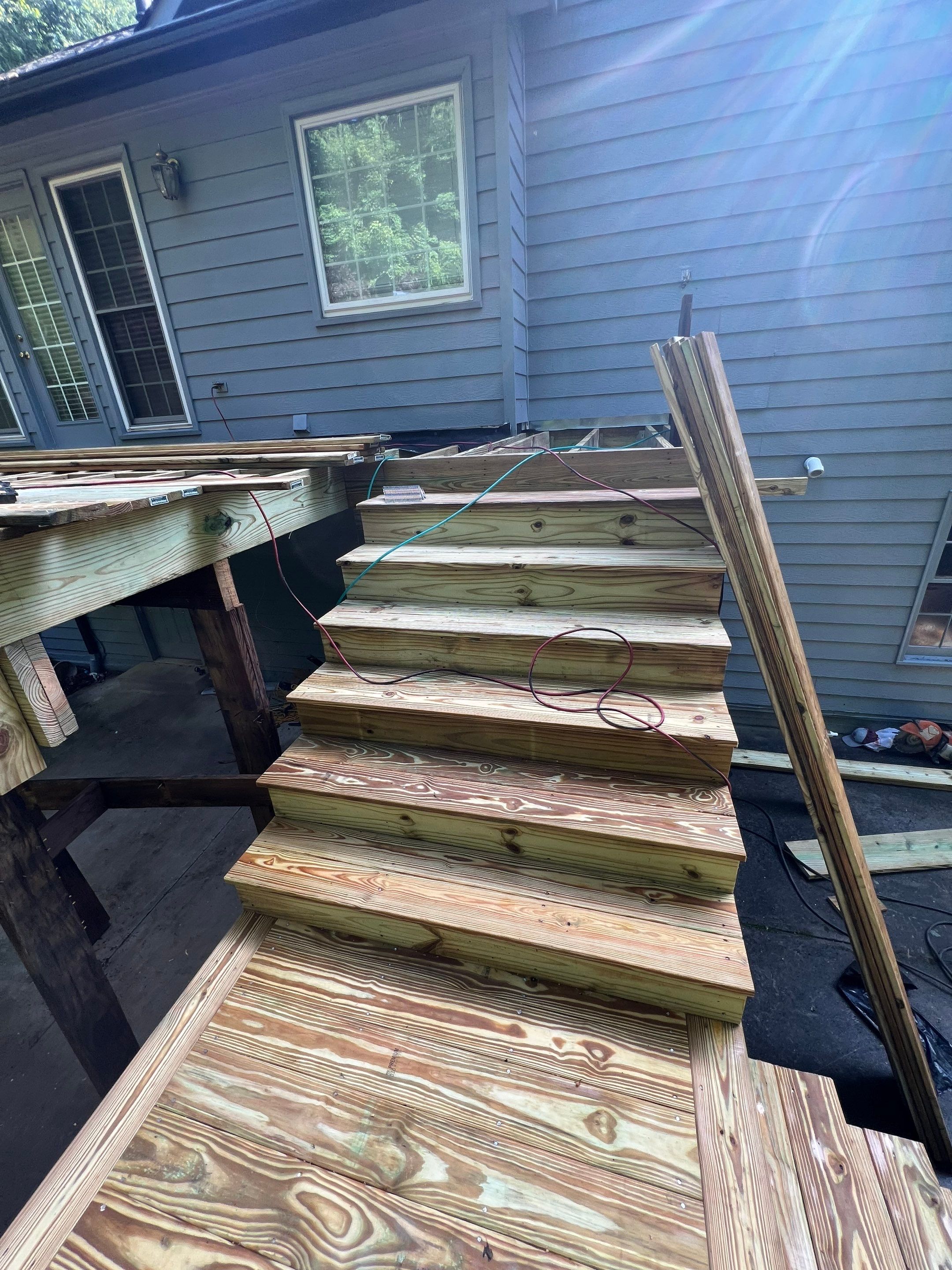 Pressure-Treated Wood Deck Replacement and Staircase Installation in Kennesaw by Swift Home Renovations