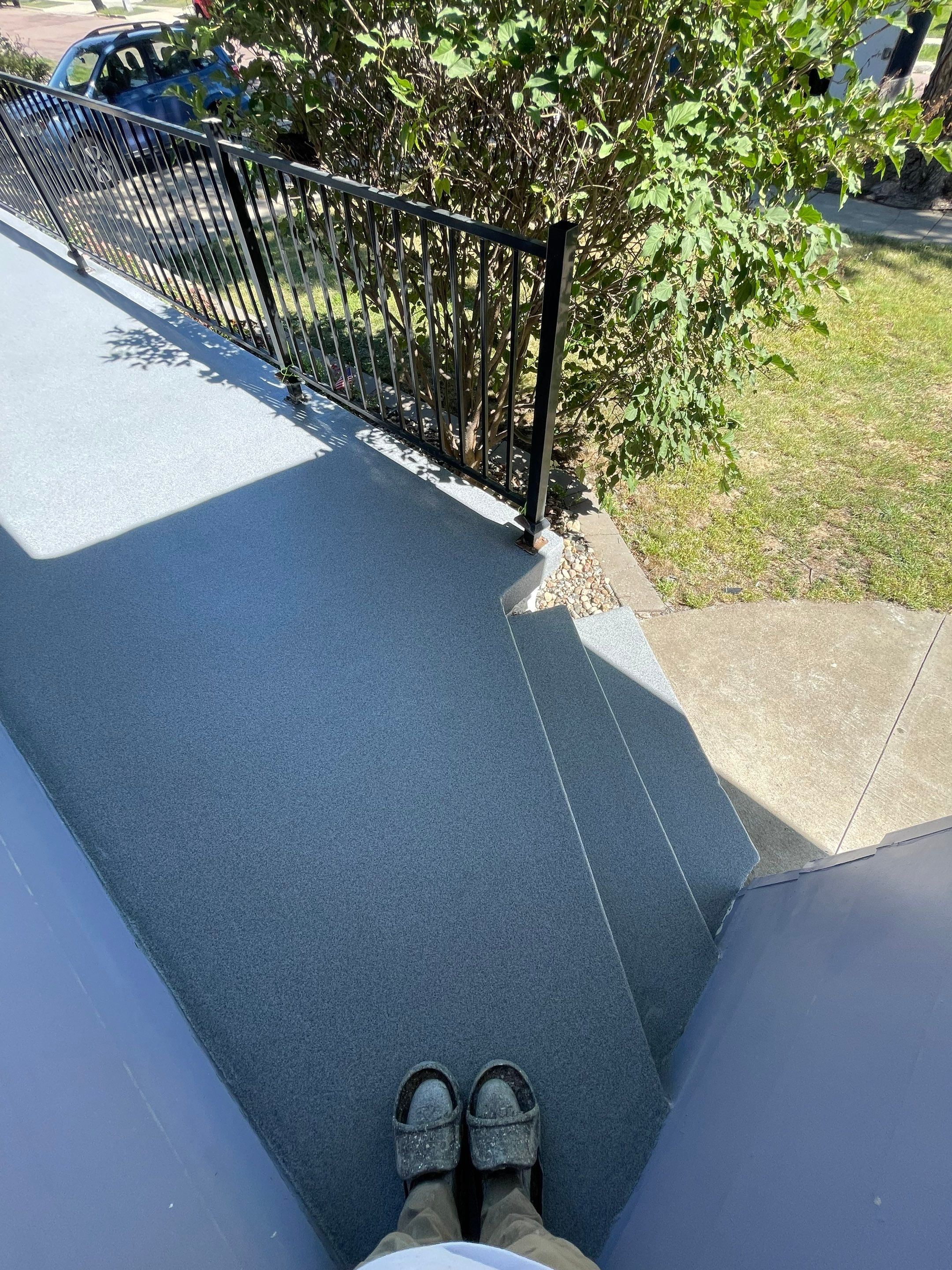 Sioux Falls Concrete Porch Coating with Starry Evening Finish by Select Painting, Coatings & Garage Cabinets