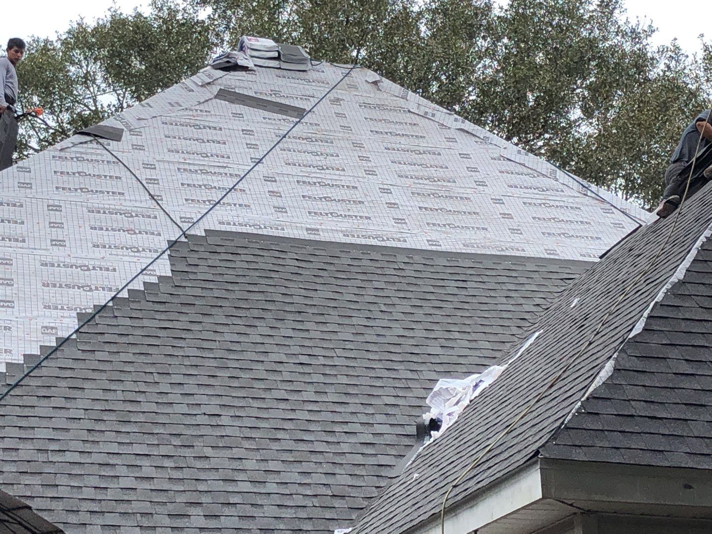 Residential Roofing Installation using Roof Replacement by American Roofing & Construction LLC