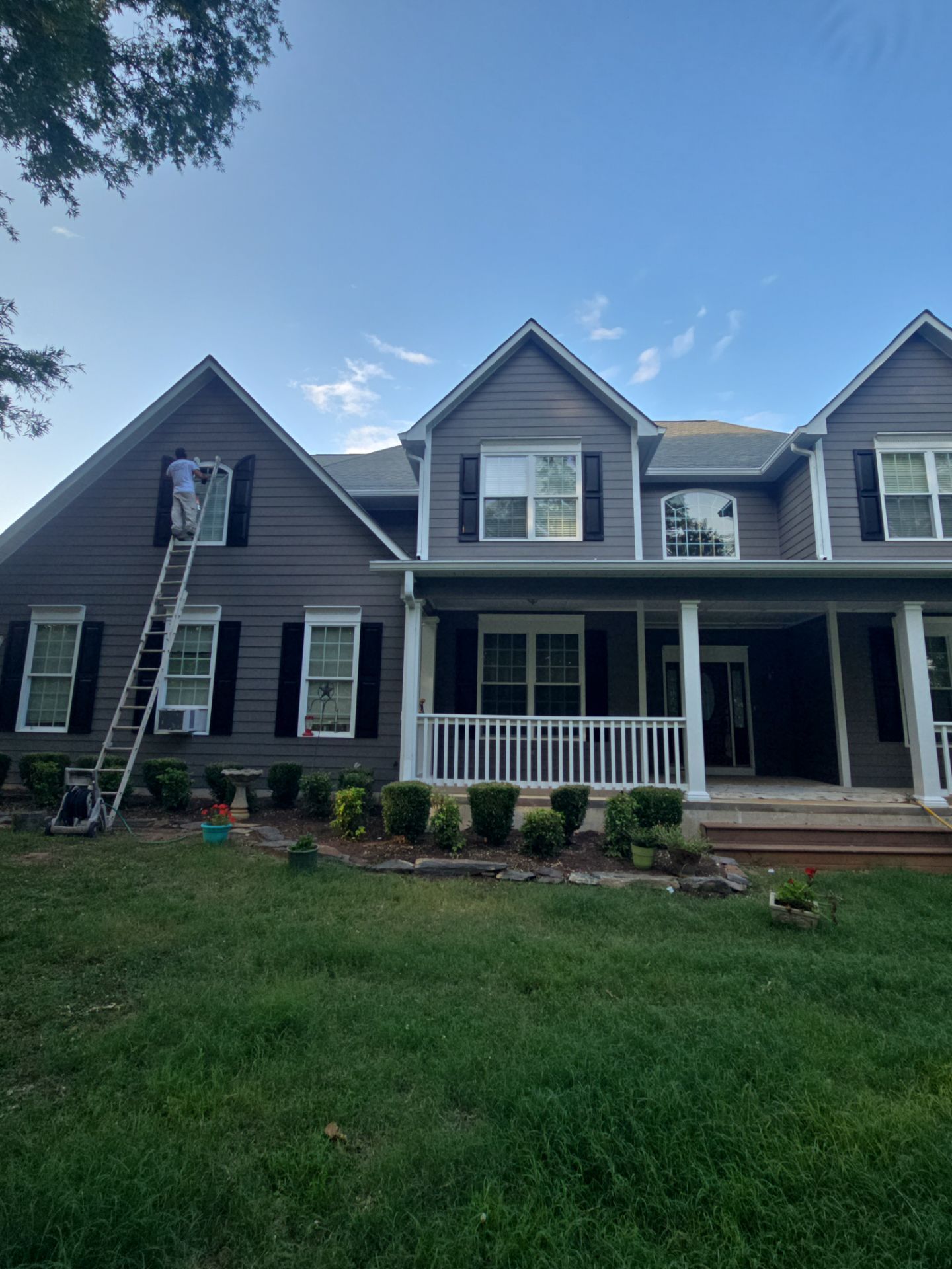 Siding replacement, exterior painting, and front door staining. by GonzalezPainters & Contractors Inc
