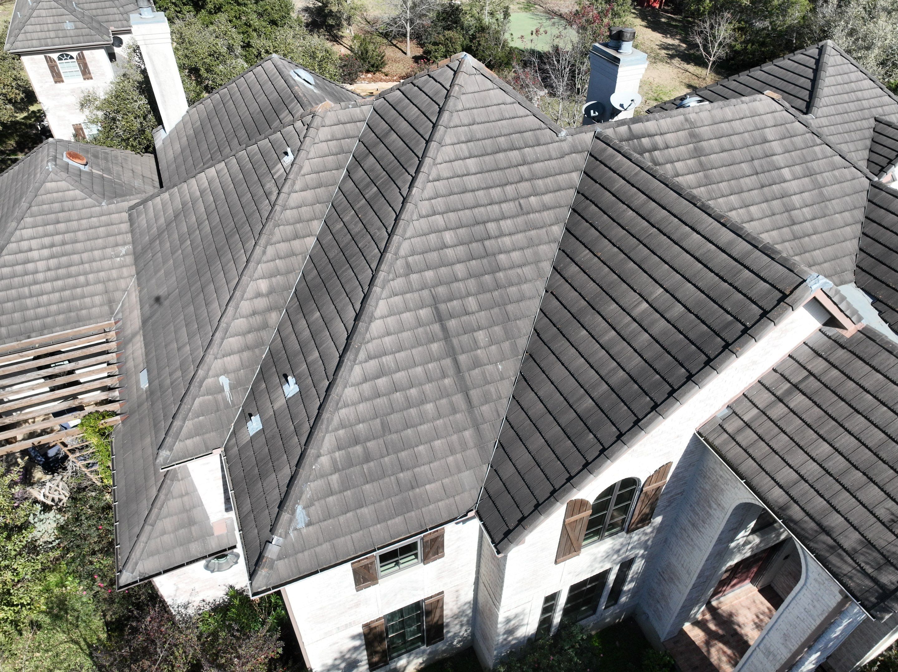 Tile Roof Repair  by Premier Roofing and Contracting