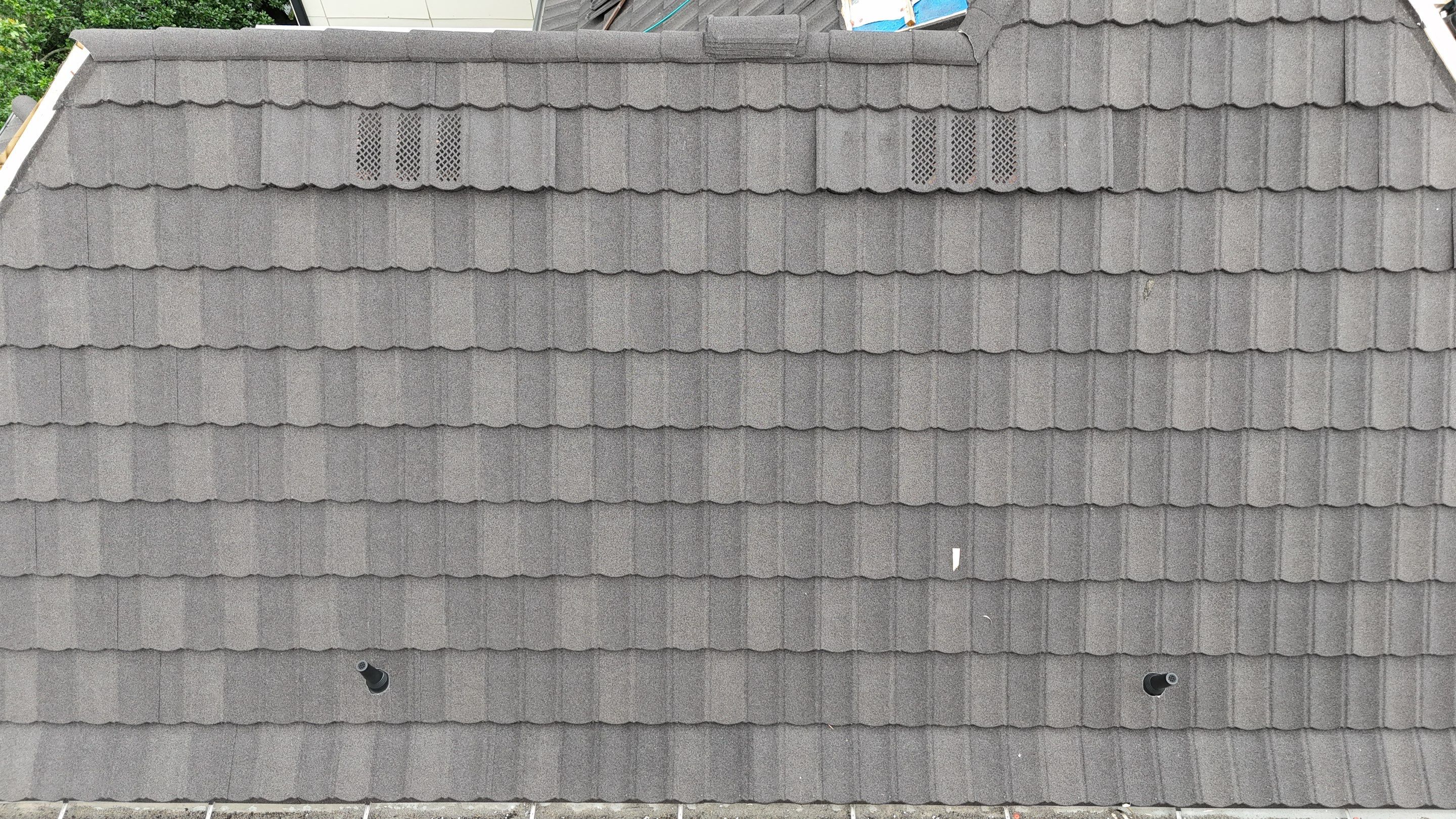 Stunning transformation from Shingles to DECRA Tile by Core Four Roofing