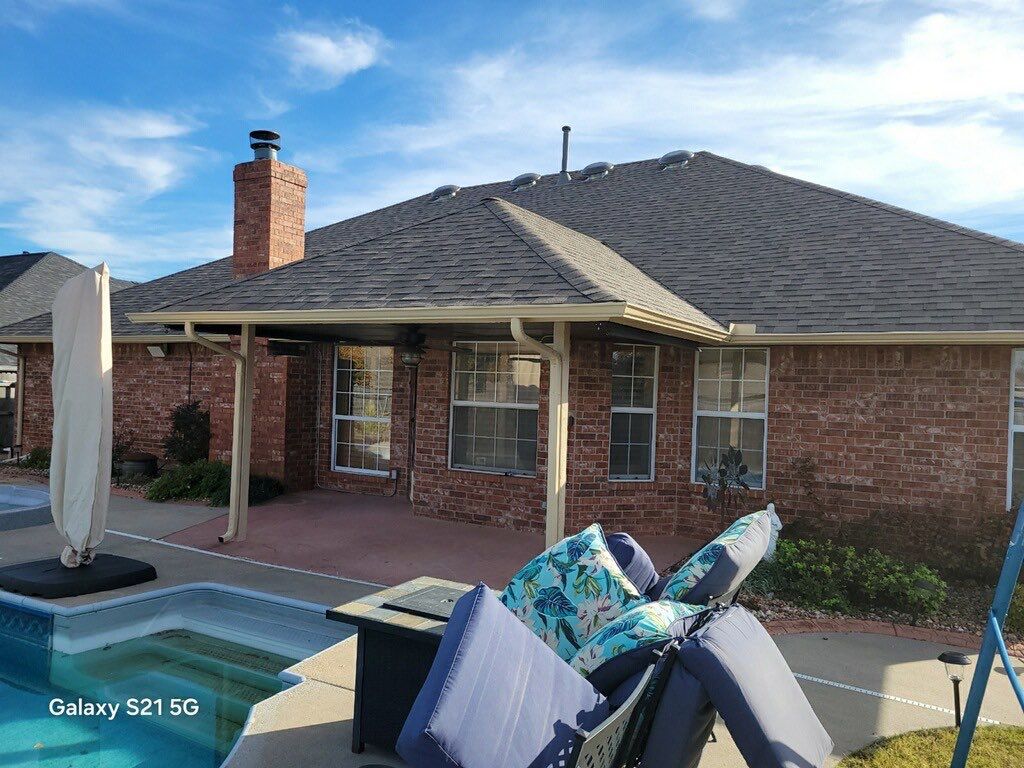 roof replacement & gutter installation in Midwest City by McCann's Roofing and Construction