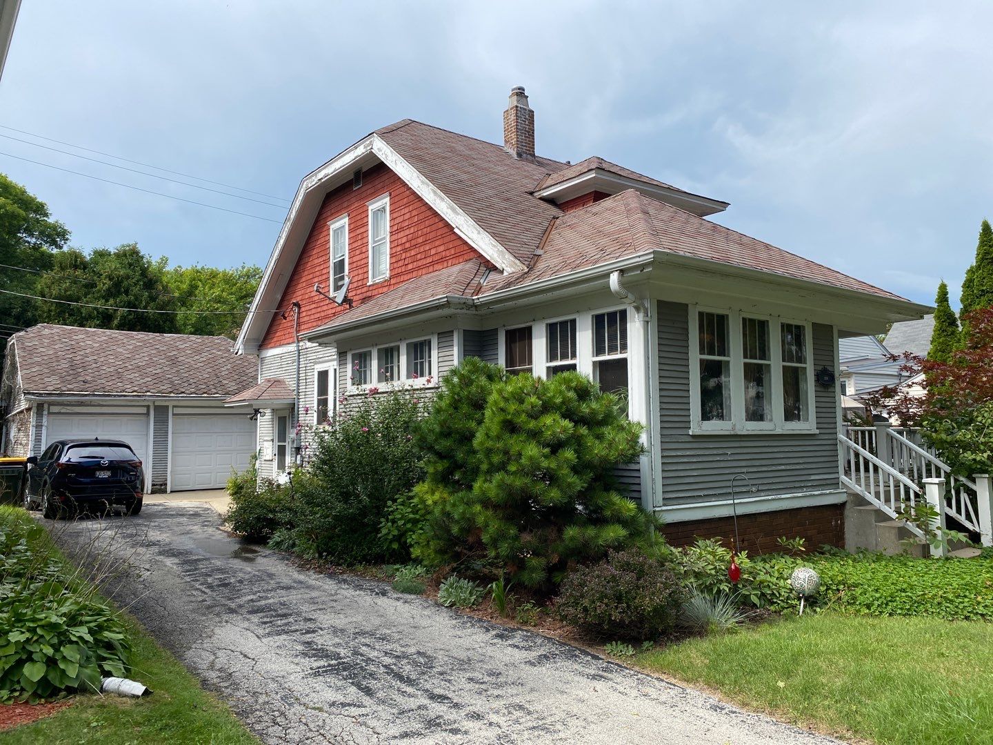 Asphalt Roof, Vinyl Siding, and Aluminum Gutter Replacement by Custom Installations