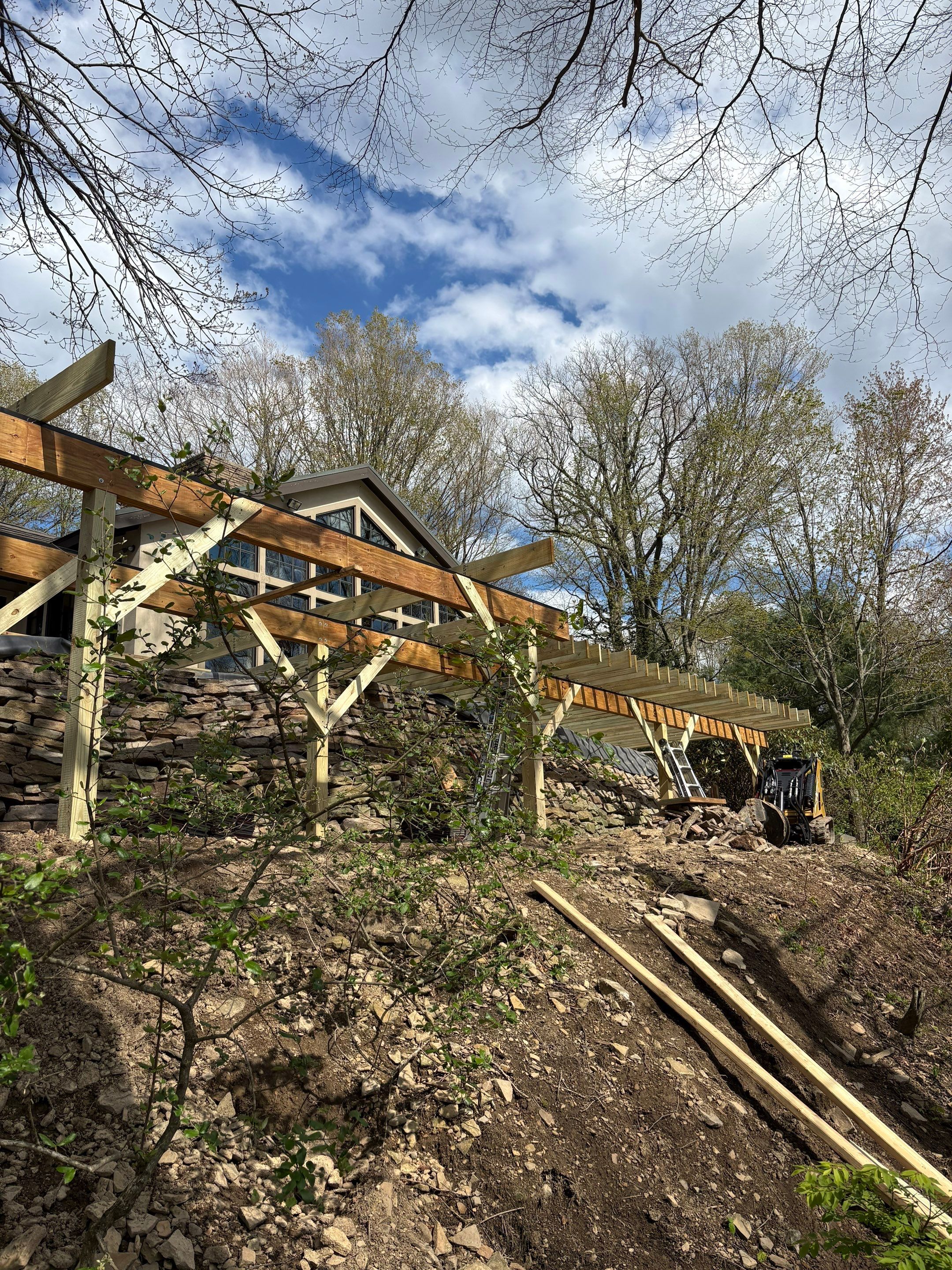 1500 sq/ft Composite Deck Build with Outdoor Kitchen in Champion by Cousins Roofing Siding & Decks