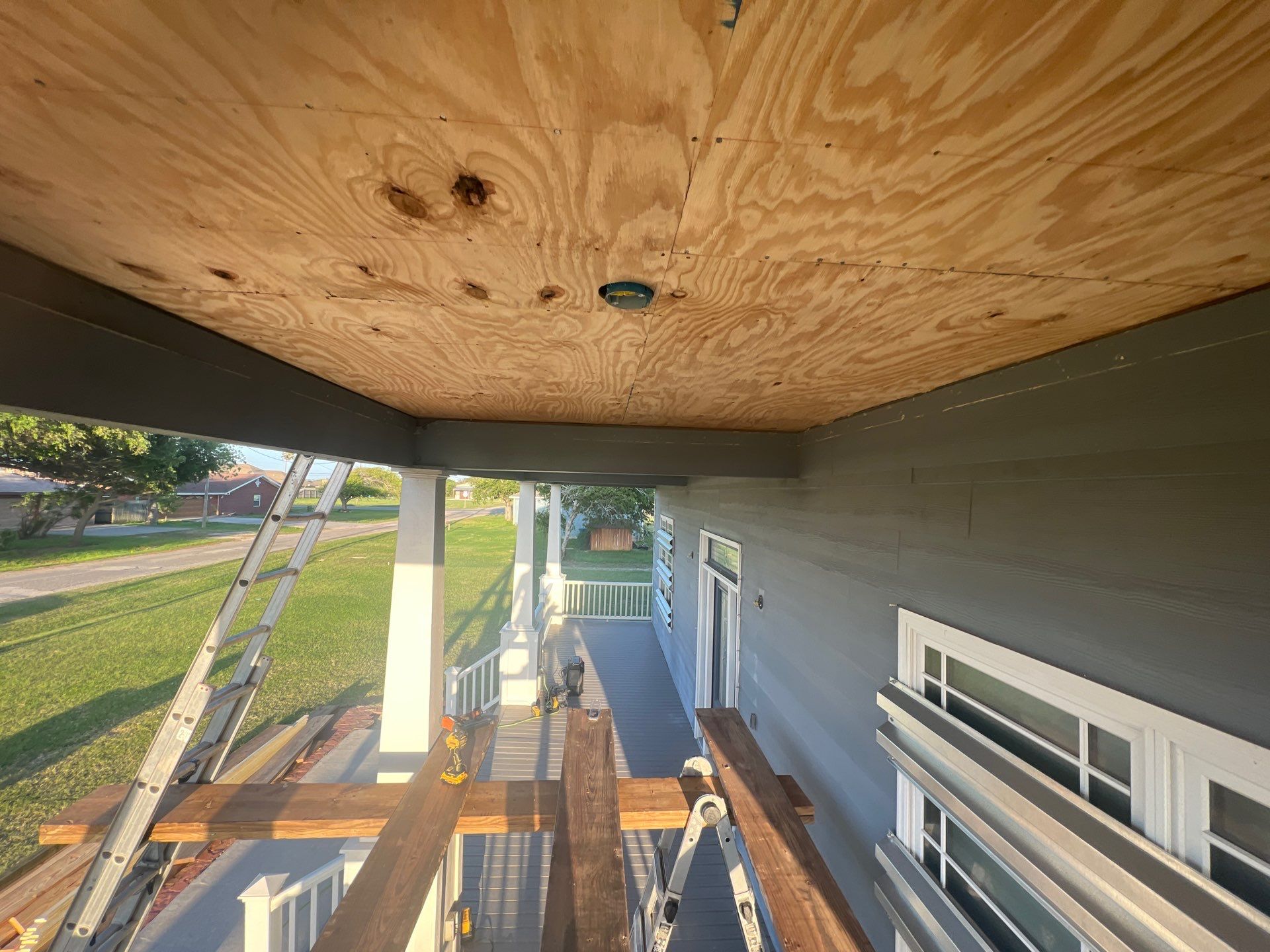 Patio? We got you Covered! by Bayfront Roofing and Construction