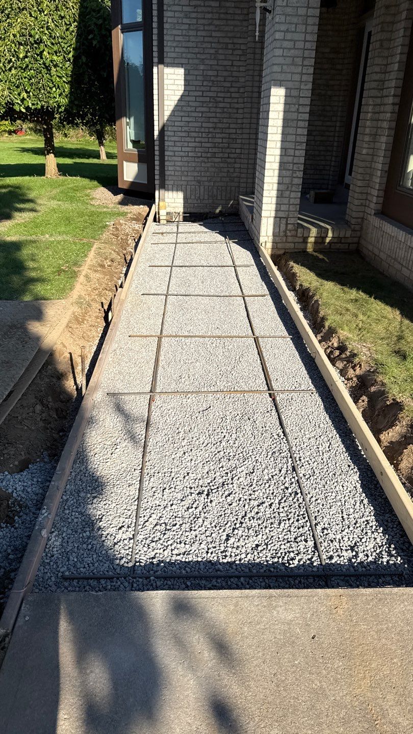 Broom finished concrete patio and walkways  by NG Masonry & Construction LLC
