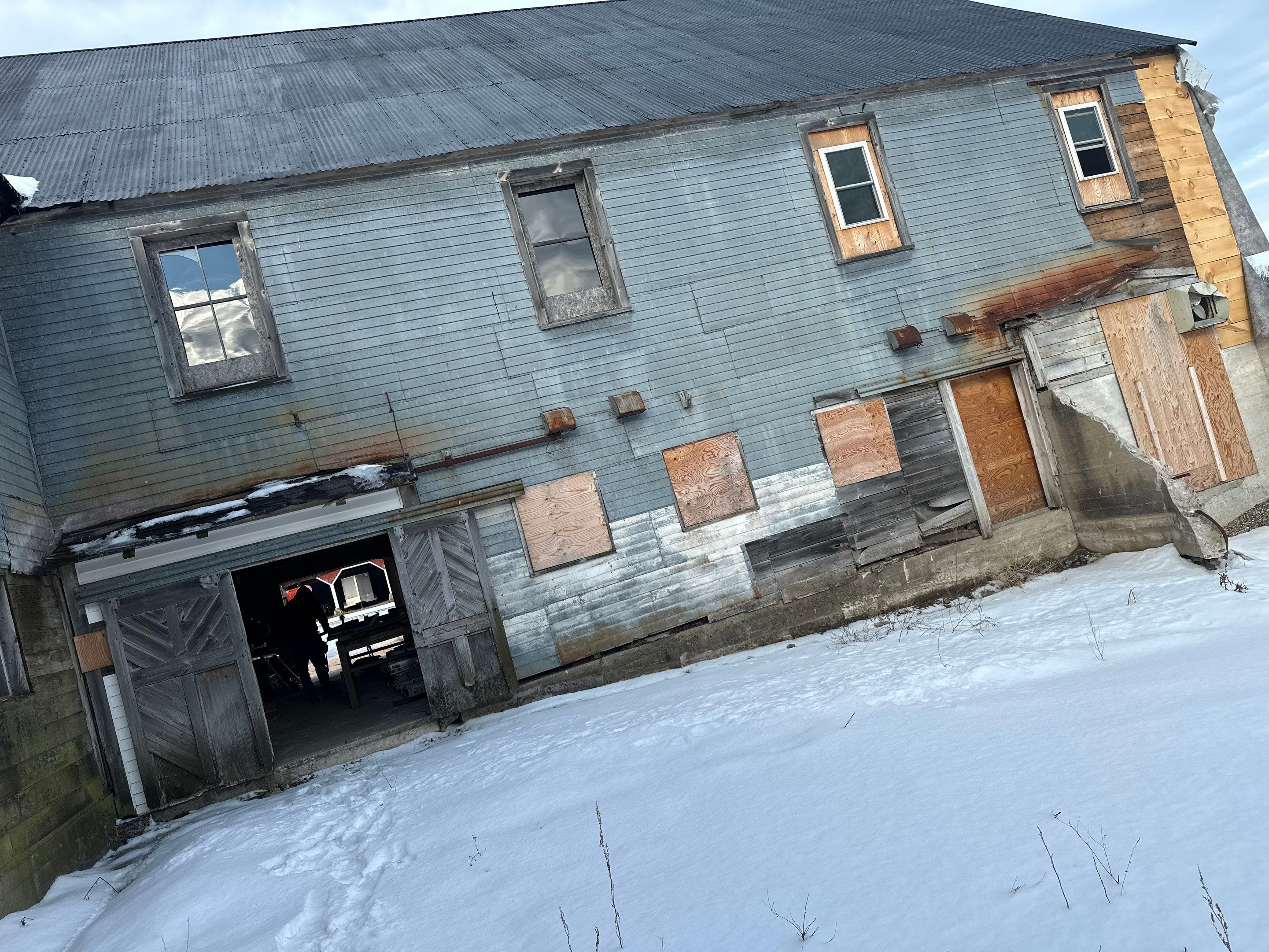 Barn Restoration and Board-and-Batten Siding Installation in Hansons Ridge by B's Roofing & Construction LLC