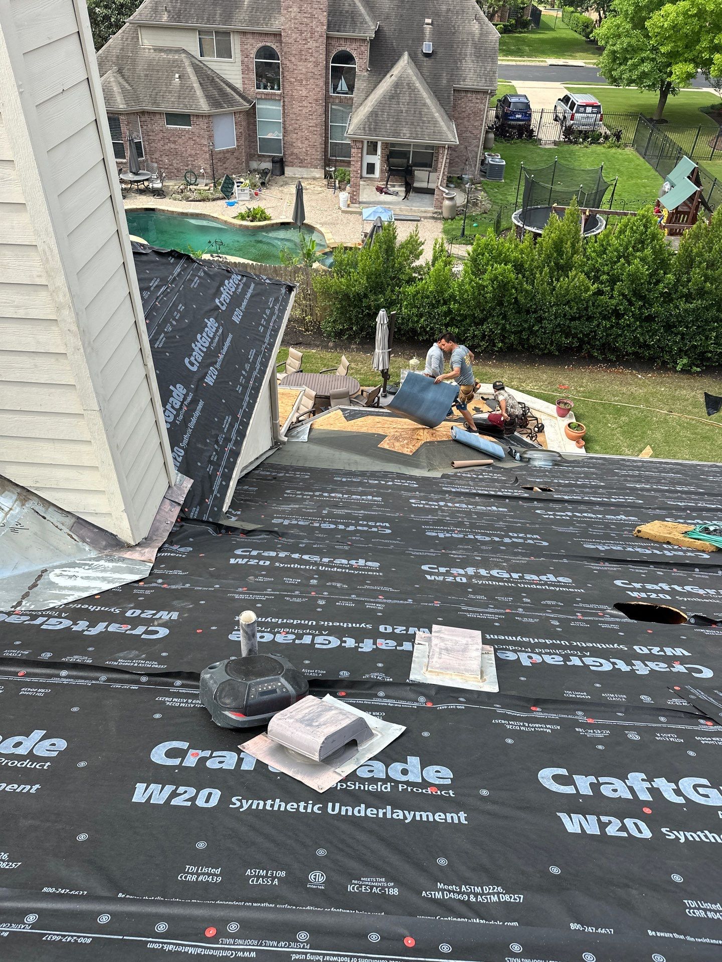 Residential Roofing Installation using Malarkey Vista Shingles Color Heather by DeZign Roofing & Exteriors