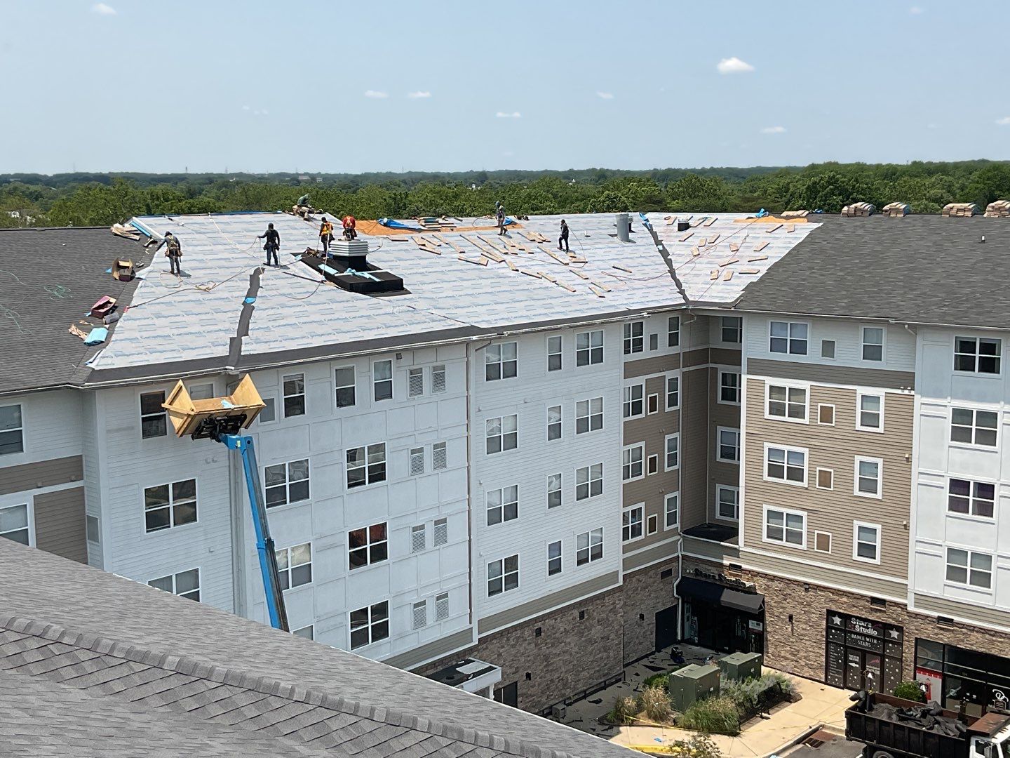 Multi-Family Commercial shingle roof by Alpha Design Services
