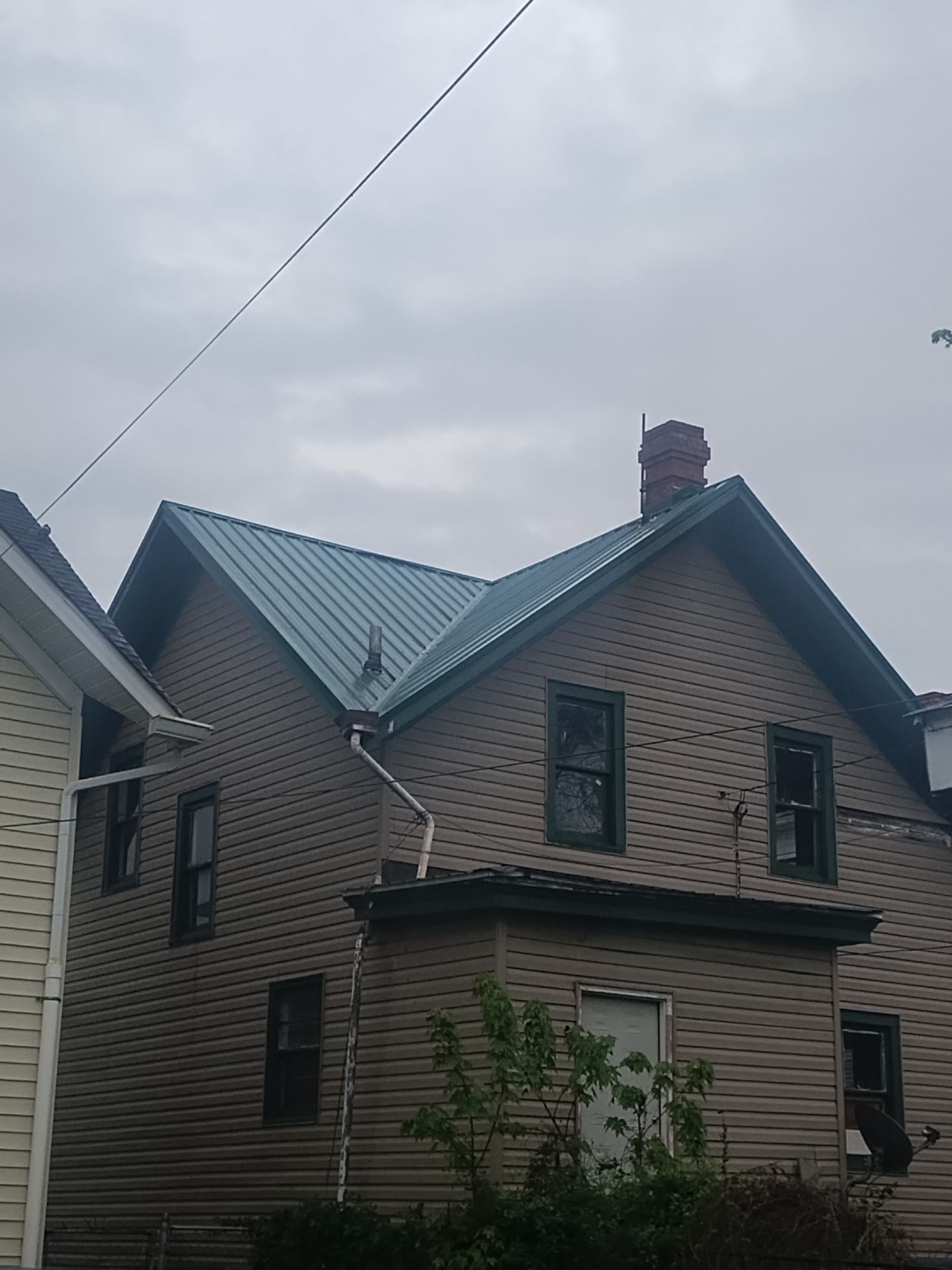 Residential Roofing Installation using Metal by Mr. Roofer
