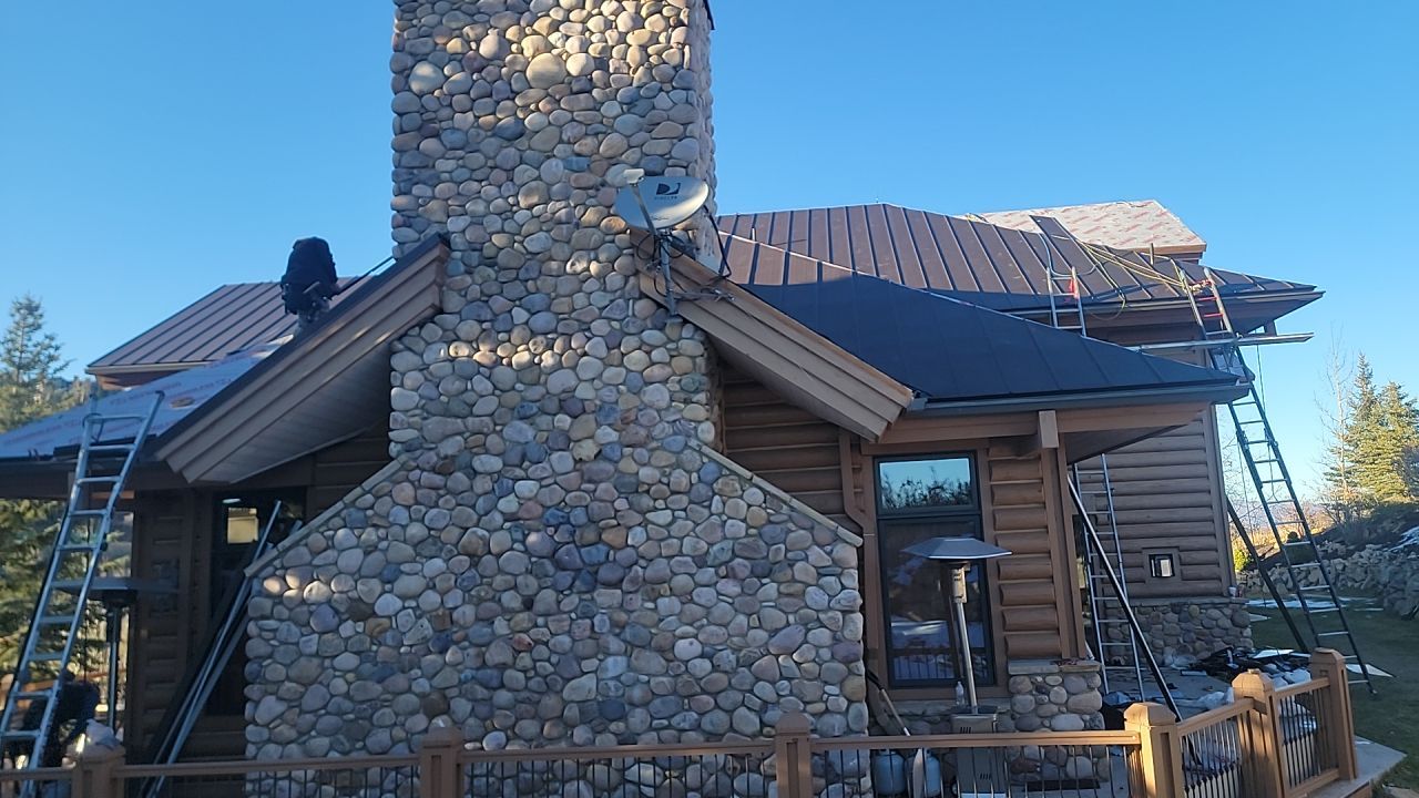 Standing Seam Metal Roof Replacement After Snow Damage by ASAP Roofing & Restoration