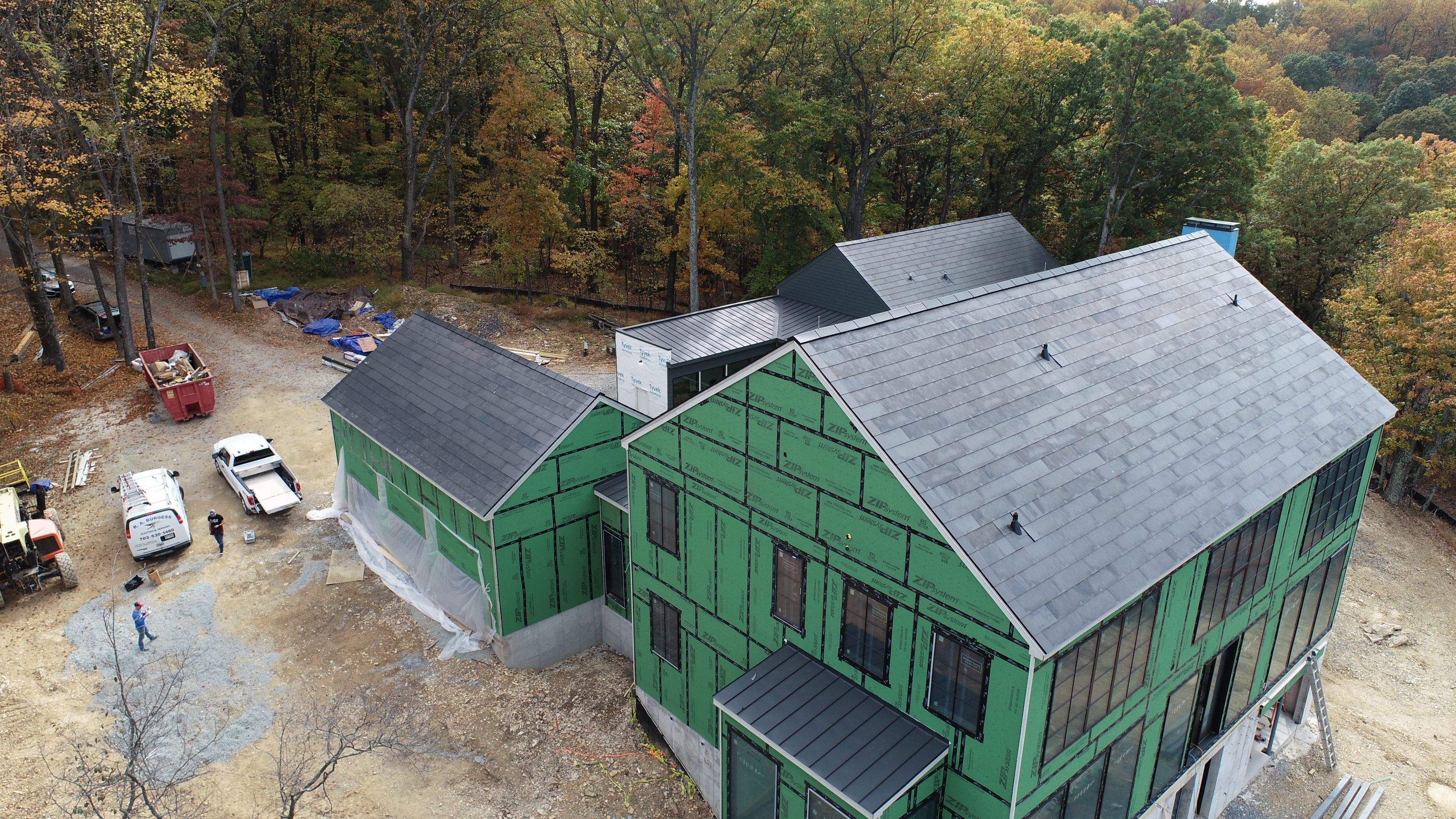 Roof Installation using Tesla Solar Roof V3 by American Home Contractors
