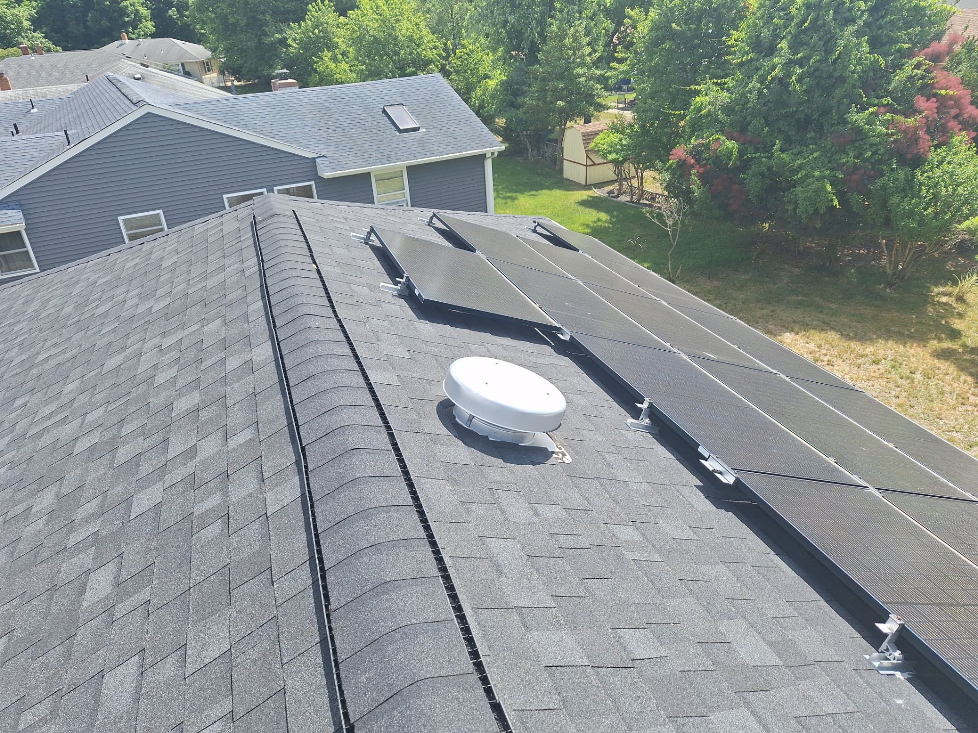 Estate Gray Shingles by Reimagine Roofing