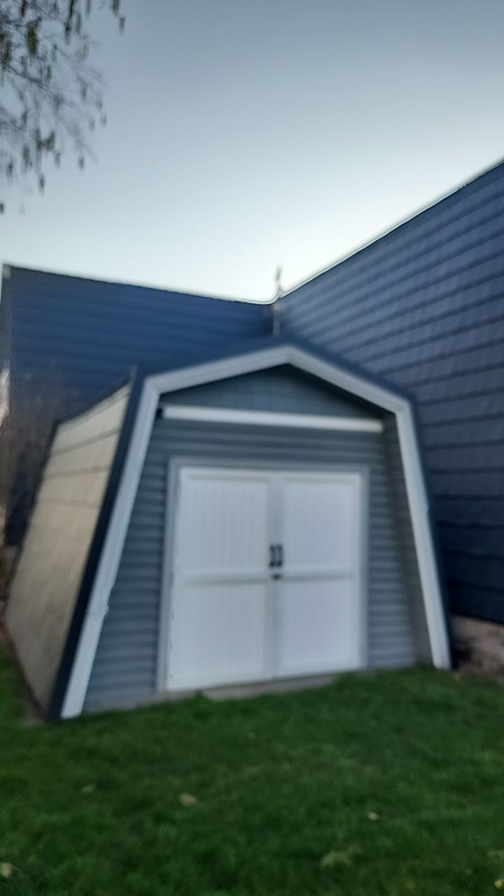 Metal Slate Shingle Roof in Sturgis, Michigan – “Darth Vader Helmet” Home by 4Ever Metal Roofing