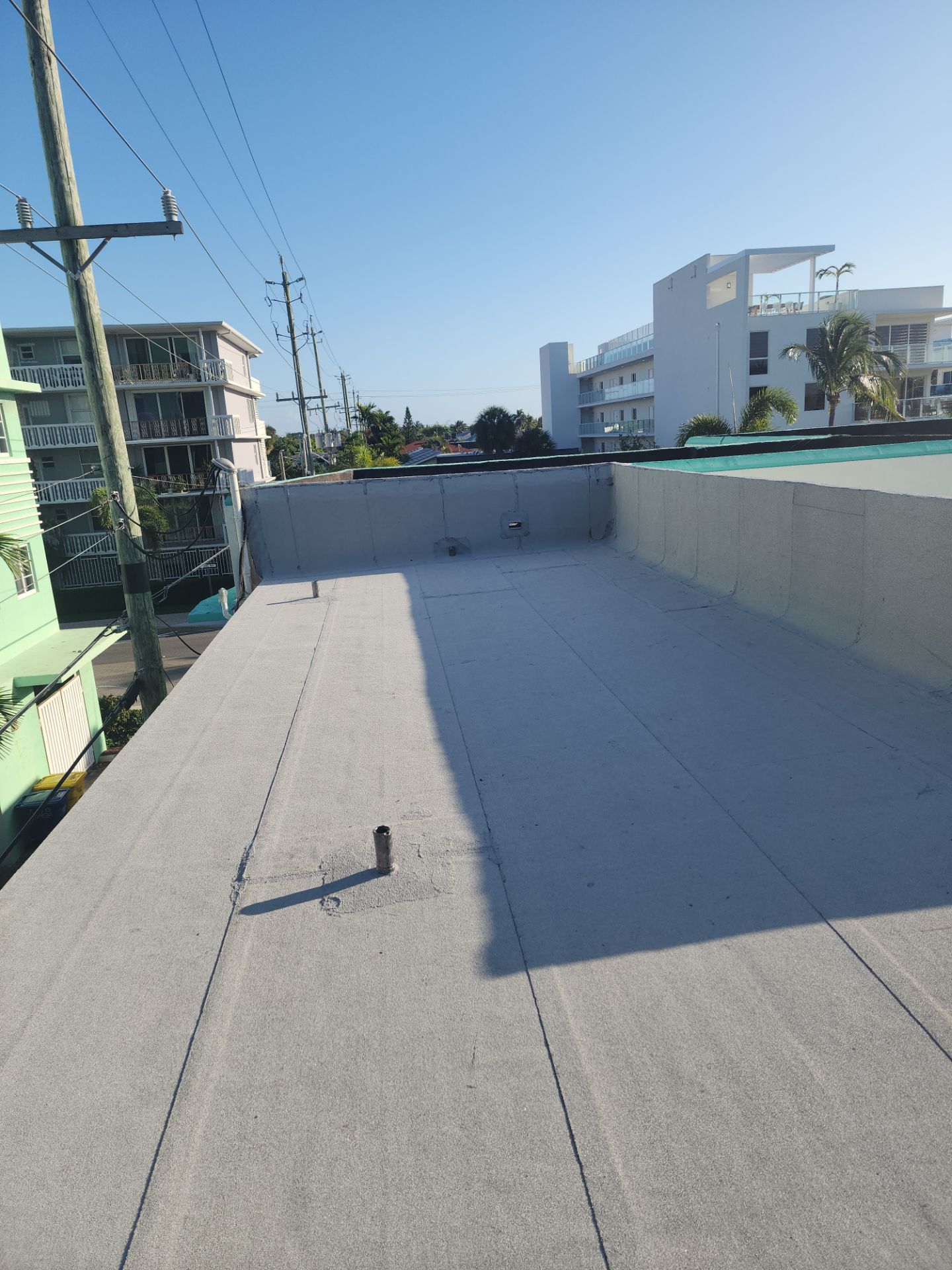 Flat Roof Replacement and Insulation Upgrade in Lake Worth Beach by Aastro Roofing