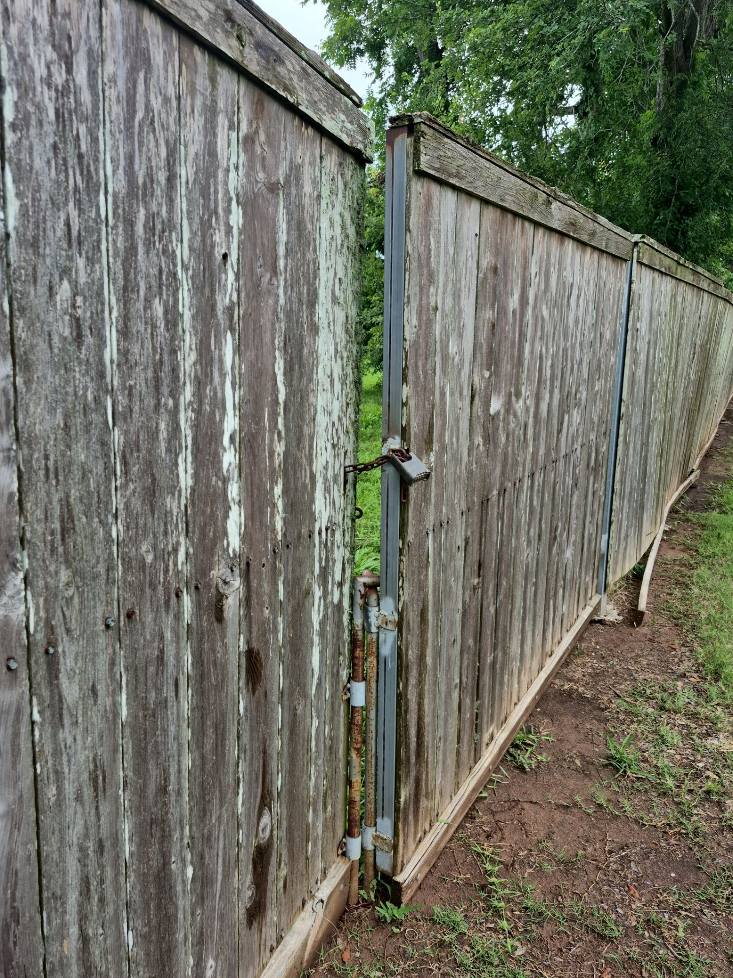 Wood Fence Installation for HOA by Tim's Fences