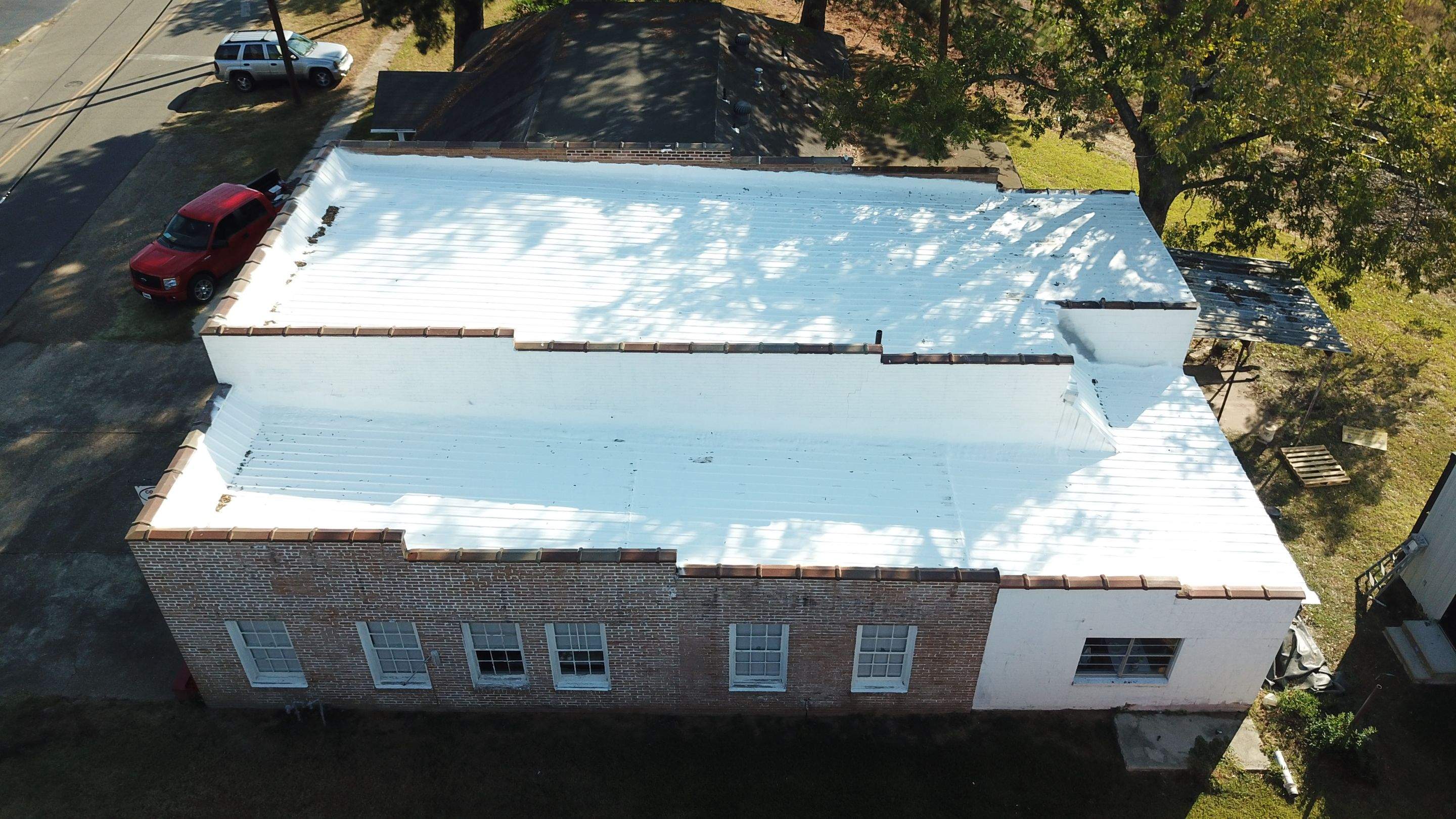 Commercial Roofing Installation using Aldocoat Coatings by Hostetler Roofing