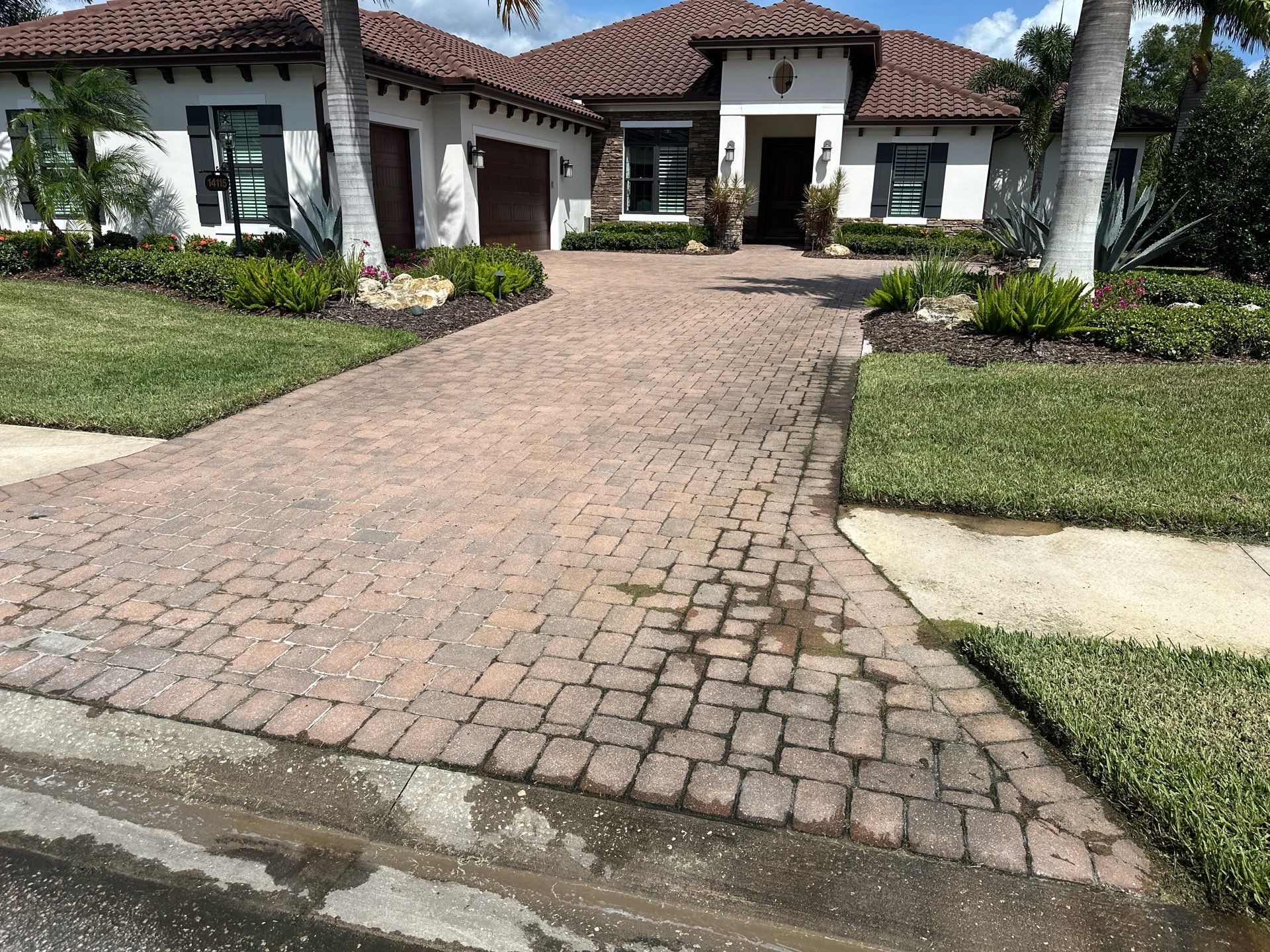Paver Driveway Cleaning, House Wash, and Pool Deck Cleaning in Bradenton, FL | Winding River Community by Sunshine AquaWash