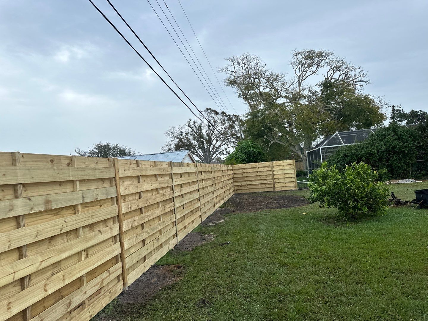 Wood Fence Installation using 6Ft Tall Pressure Treated Wood Privacy Fence by Asap fence and gates, LLC