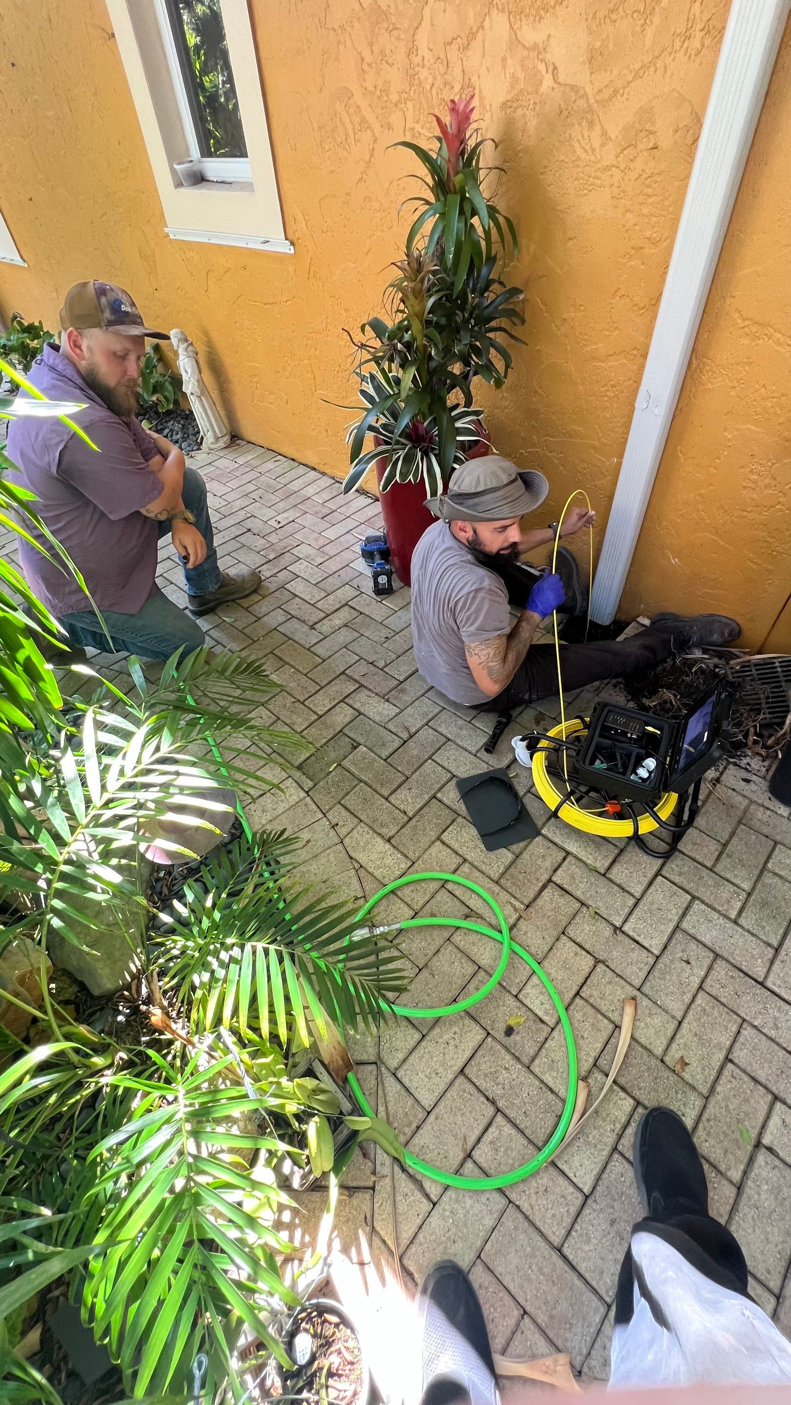 Residential Stormwater Gutter Drain System Maintenance by APS Power & Water