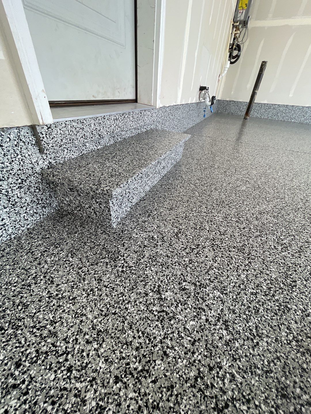 Garage Transformation using Domino by Croc Coatings, LLC