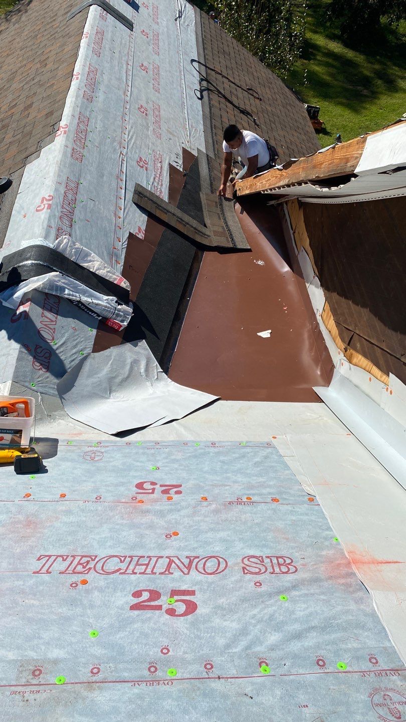 Residential Roofing Installation using Roof Replacement by American Roofing & Construction LLC