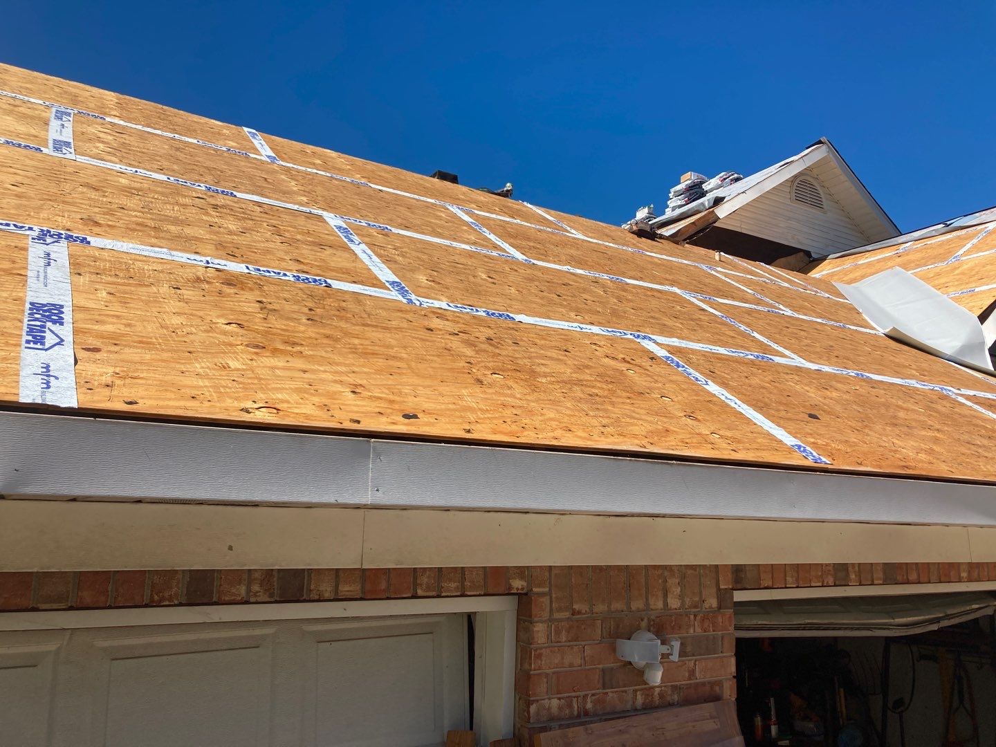 Residential Roofing Installation using Roof Replacement by American Roofing & Construction LLC