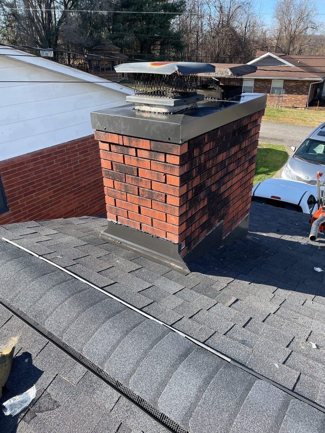 Residential Roofing Repair Chimney Flashing and Cap by Secure Construction Company Inc