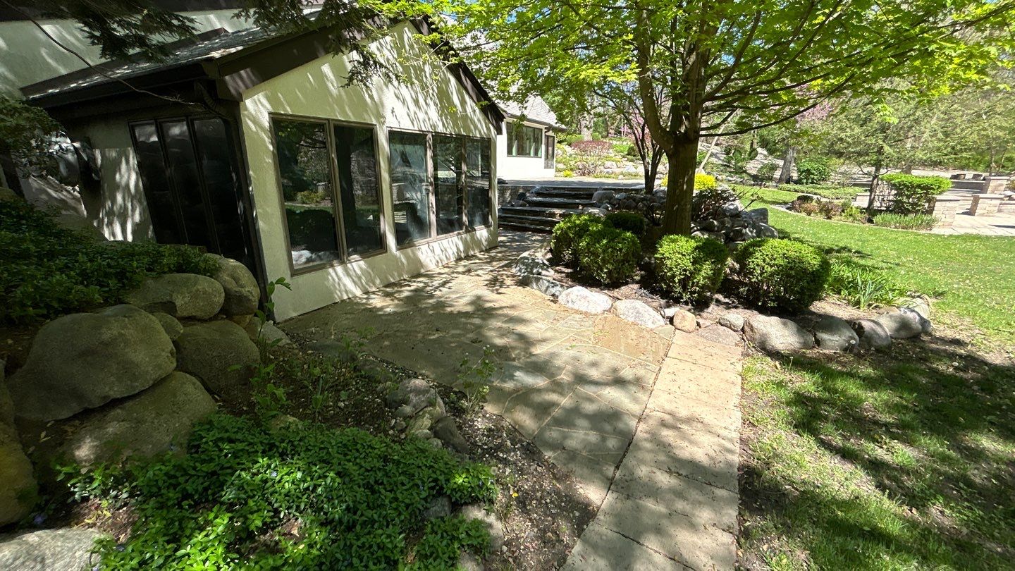 natural stone using Algaecide, soft wash soap by Northern Power Washing LLC.