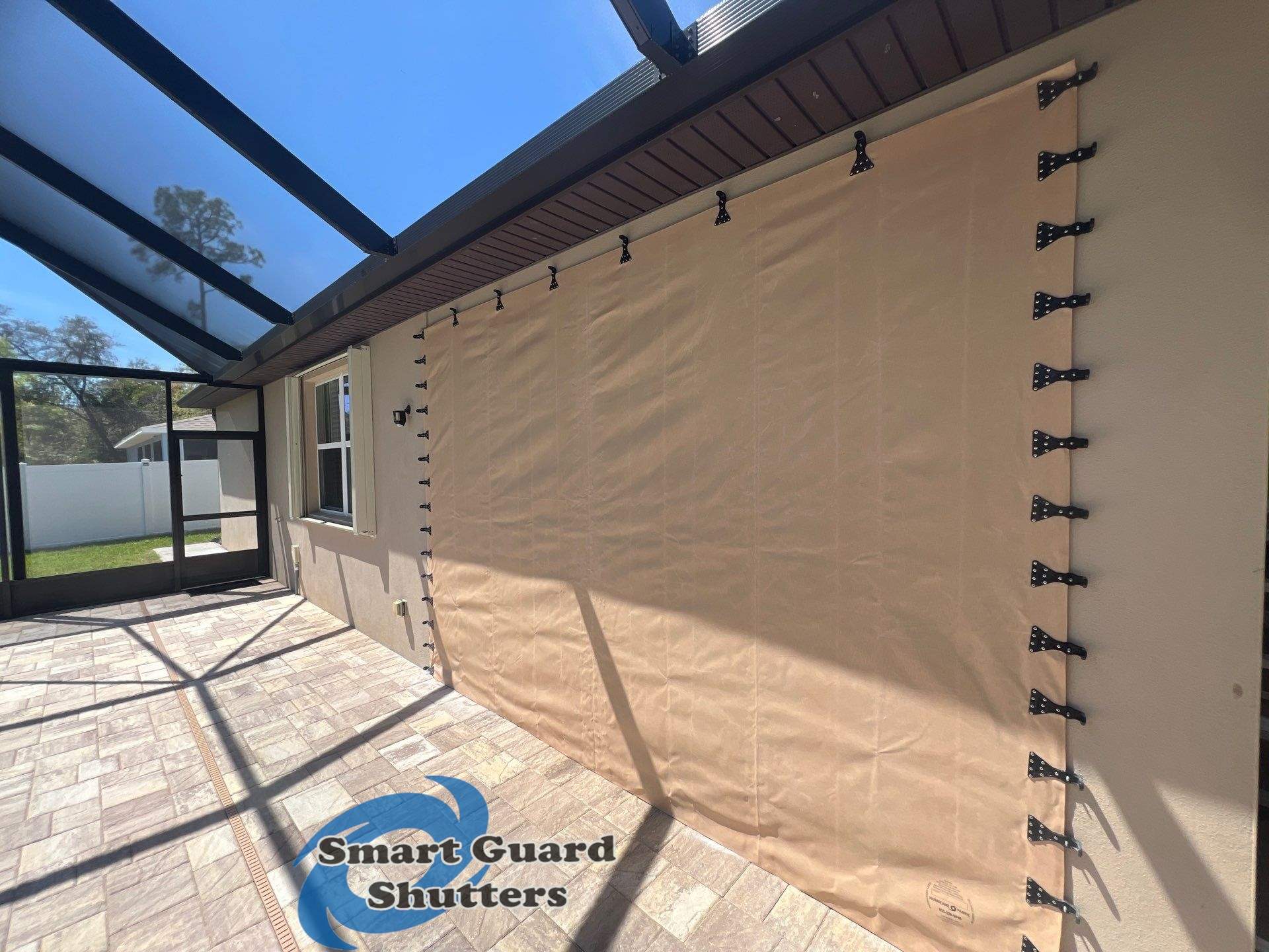 Hurricane Protection in Tan / Ivory by Smart Guard Shutters