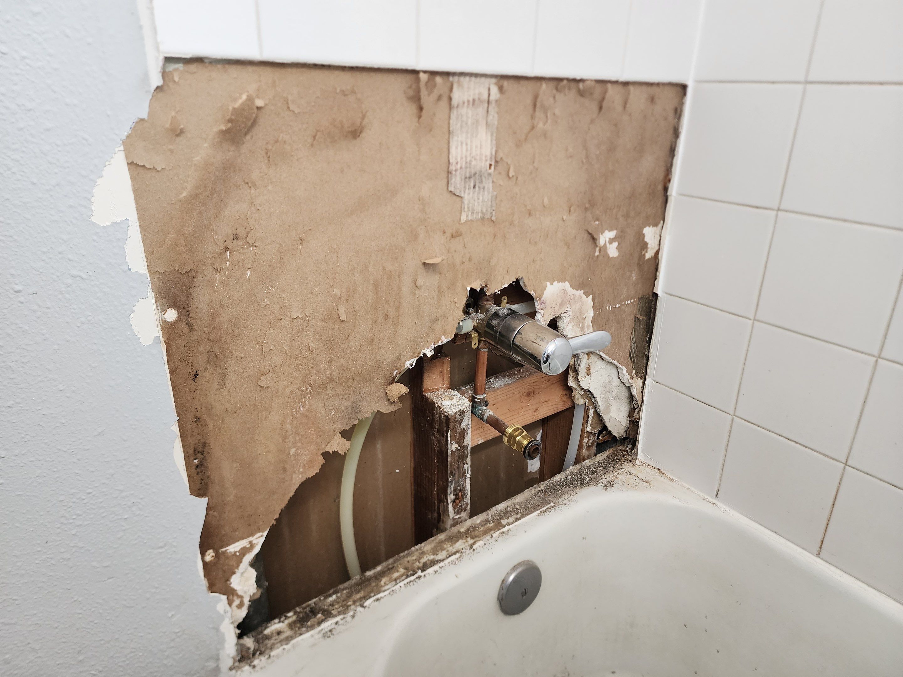 Shower Tile Repair by Handyman State LLC