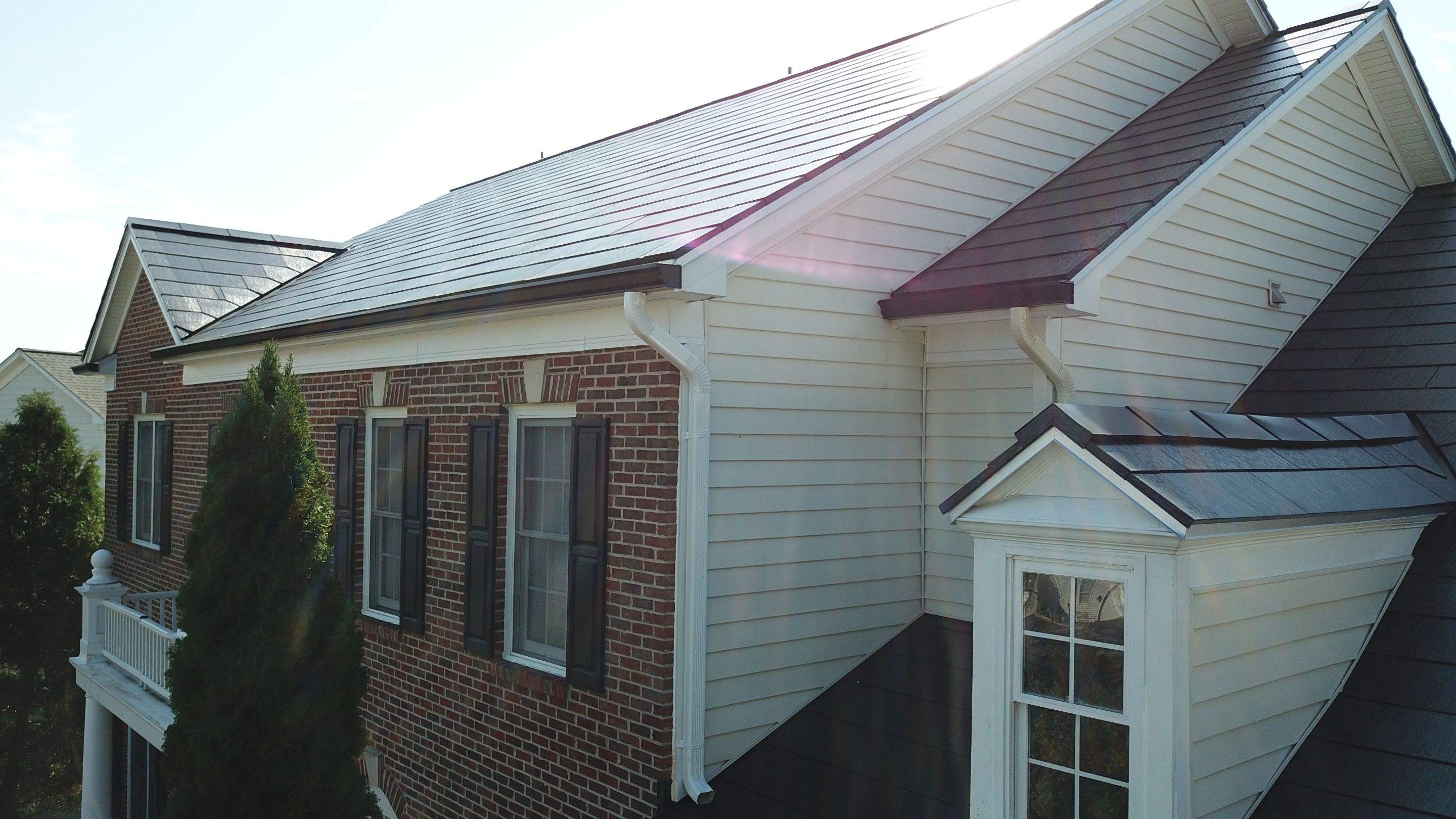 Tesla Solar Roof Replacement using Tesla Solar Roof V3 tiles by American Home Contractors