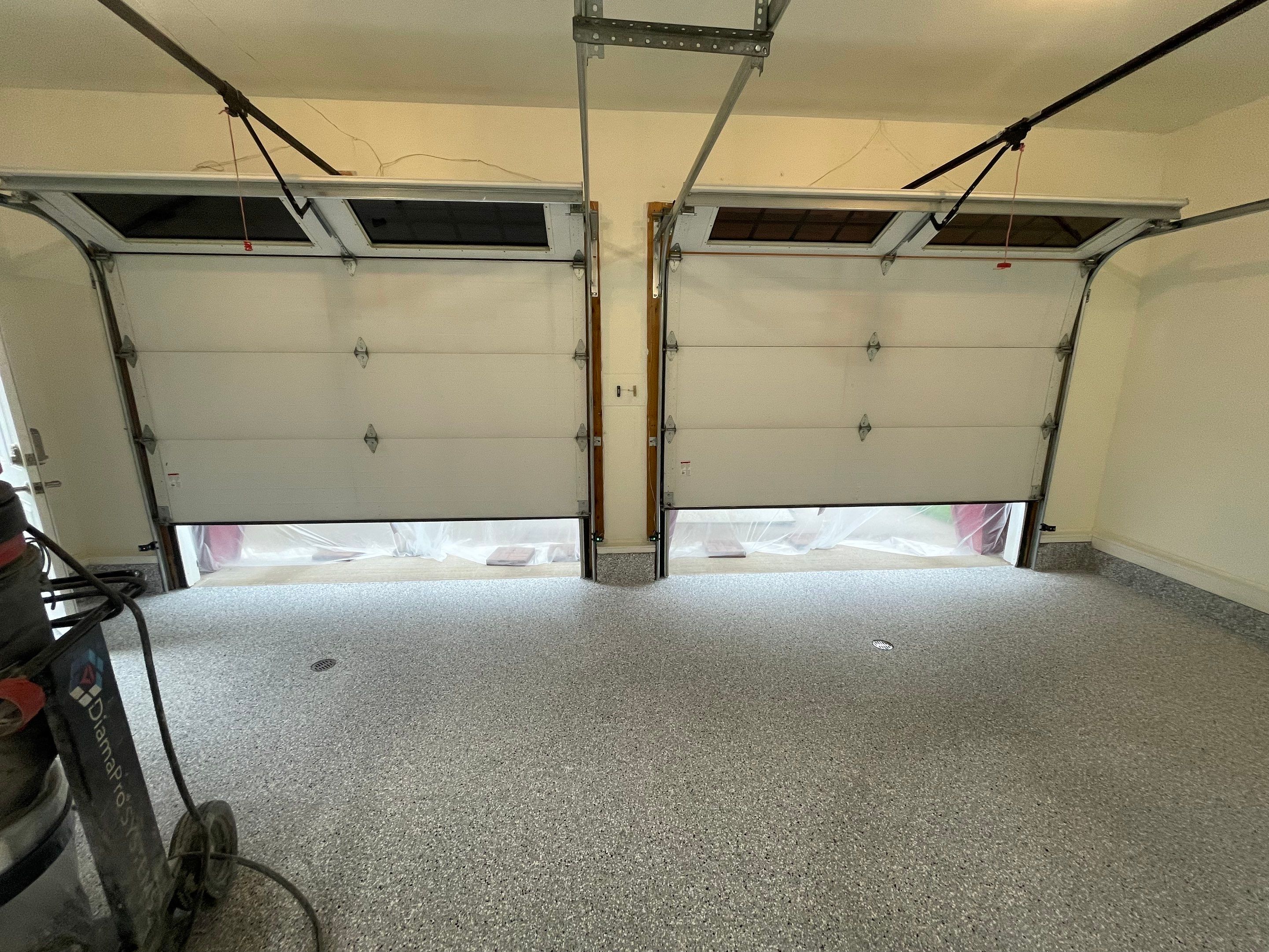 Madison Garage Concrete Coating with Feather Grey Speckle Finish by Select Painting, Coatings & Garage Cabinets
