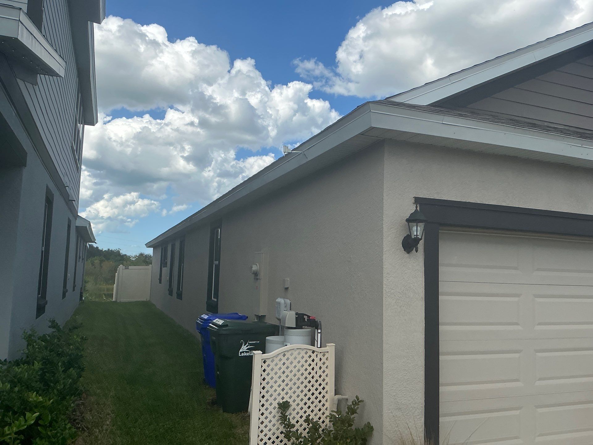 3X4 elbow Downspouts using Musket Brown Seamless Gutters in Lakeland FL by Gutter Professors