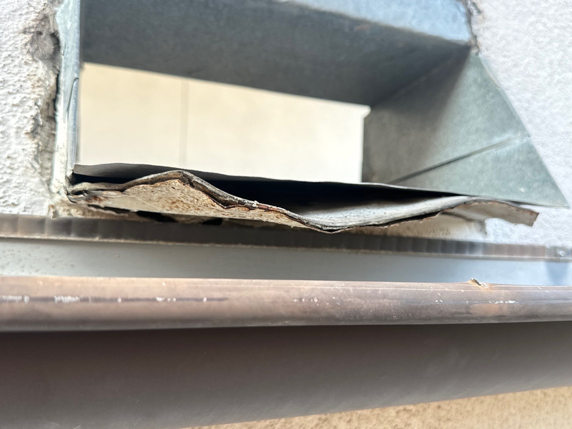 Scupper Repair Wall Leak by Associates Roofing Unlimited 